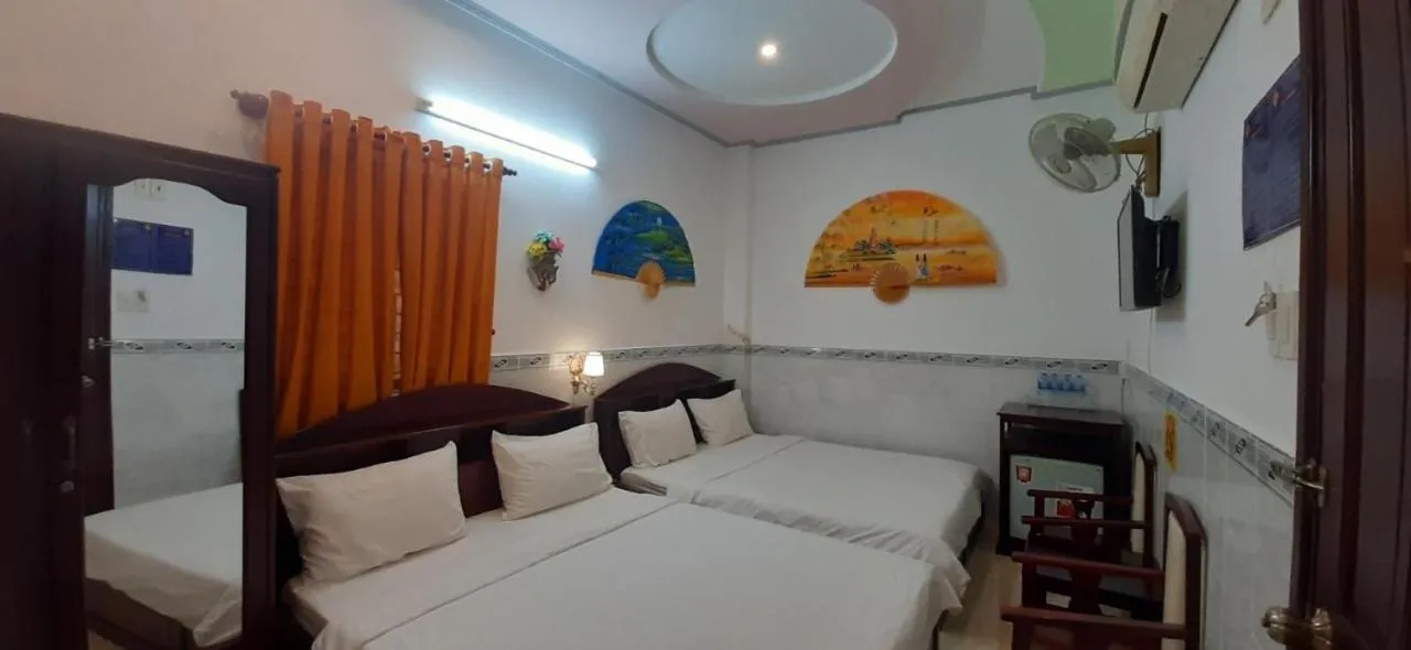 Bed in Huynh Lac Can Tho Hotel
