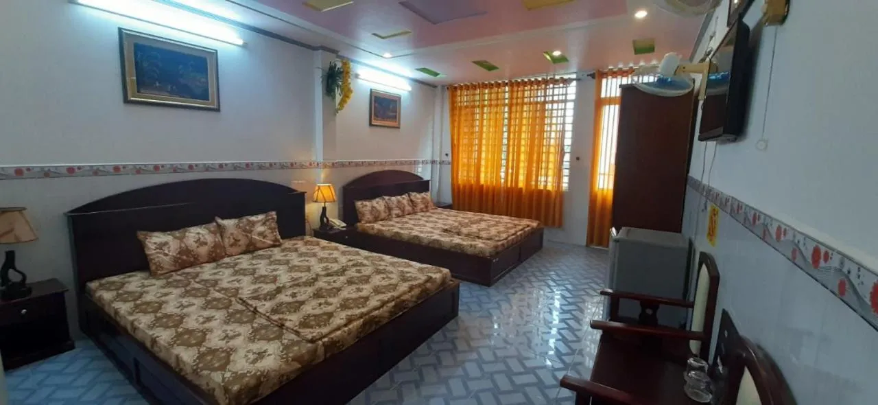 Bed in Huynh Lac Can Tho Hotel