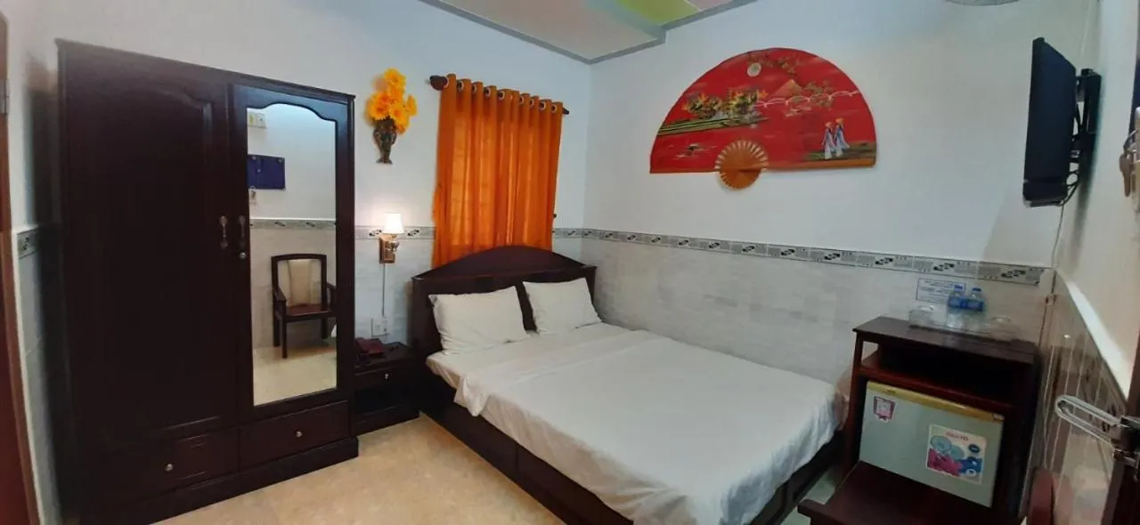 Bed in Huynh Lac Can Tho Hotel