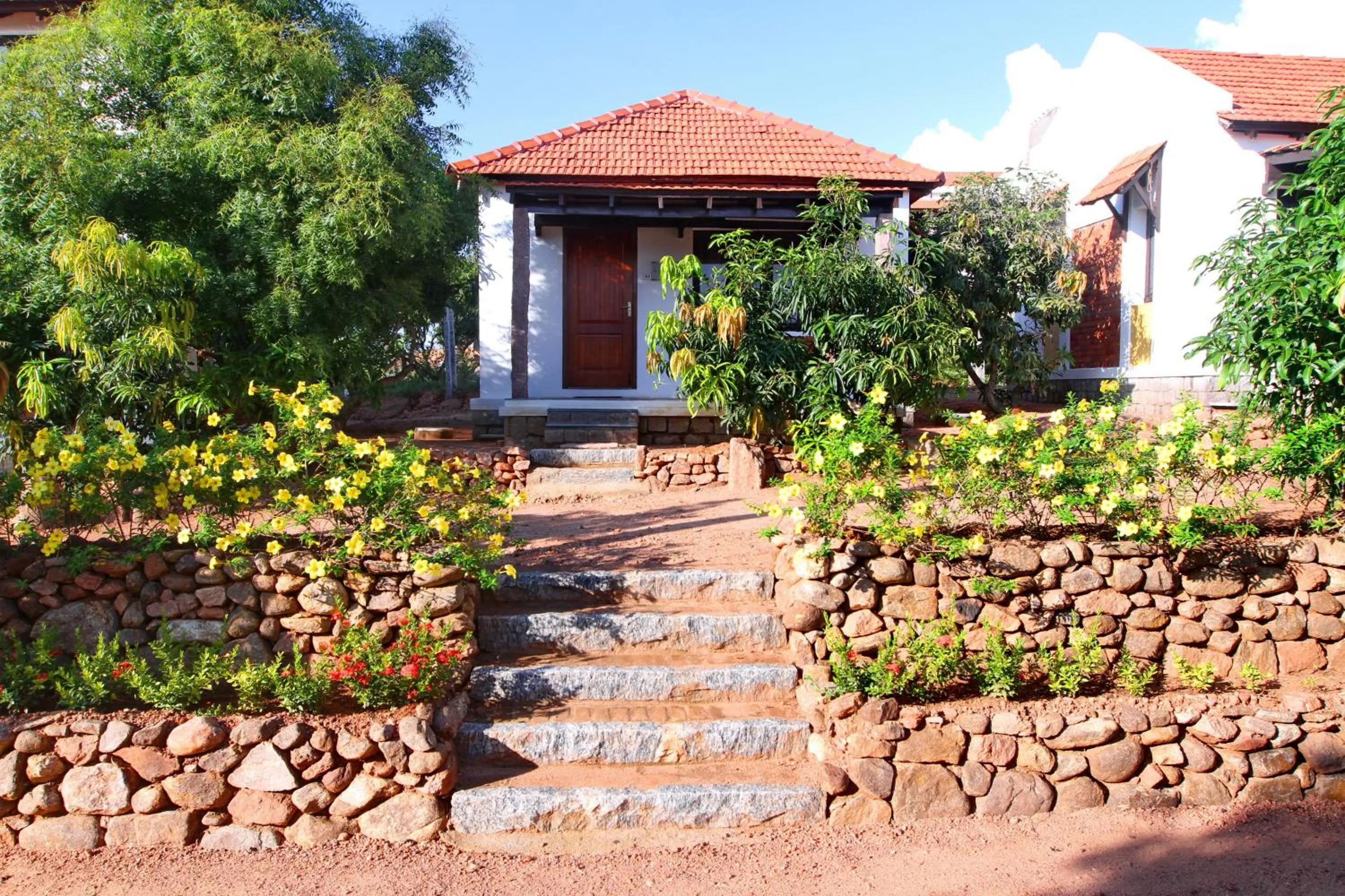 Seating area in Kadambavanam Ethnic Village Resort