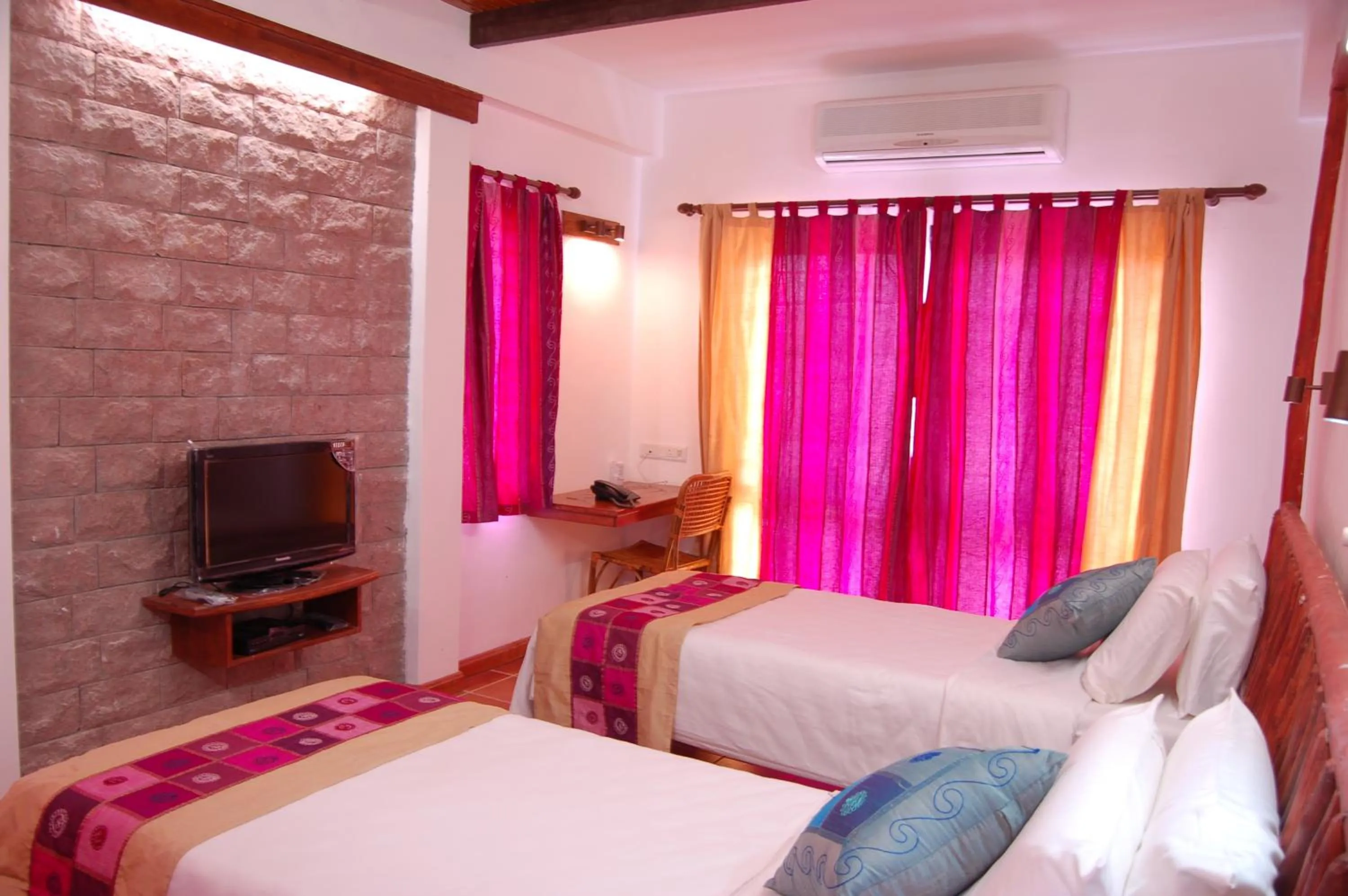 Bedroom, Bed in Kadambavanam Ethnic Village Resort