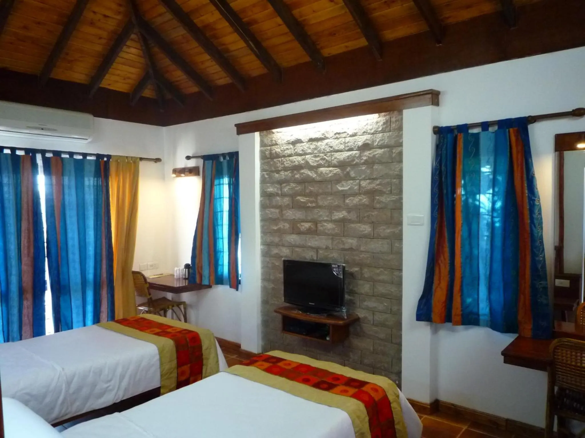 Bedroom, Bed in Kadambavanam Ethnic Village Resort