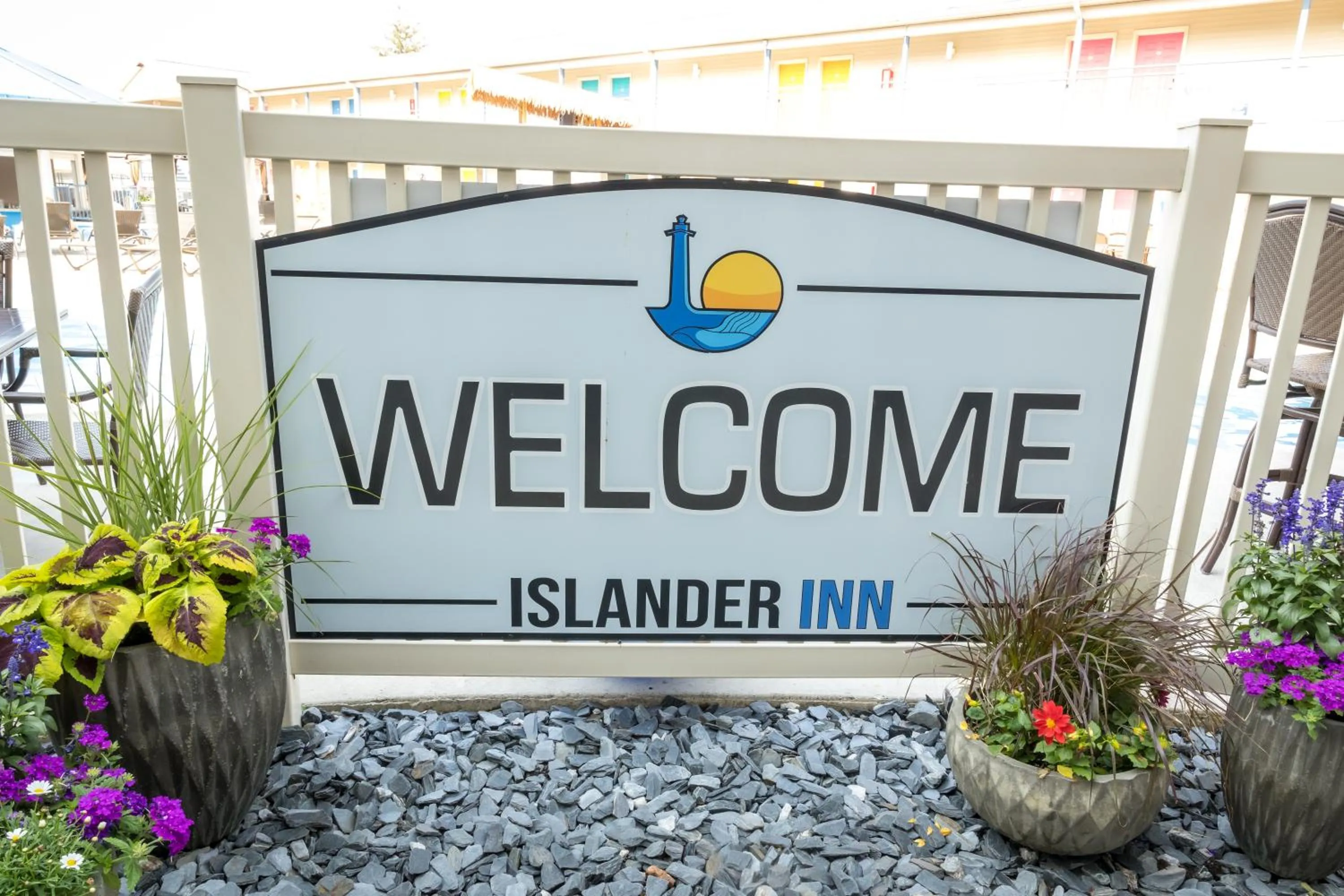 Property logo or sign in Islander Inn