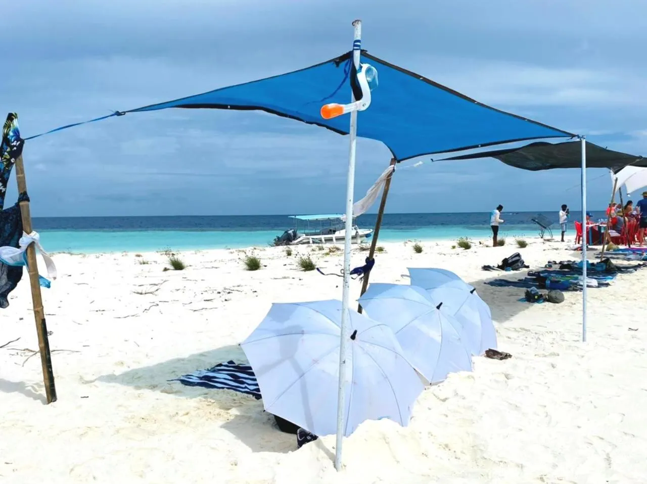 By the shade Maldives