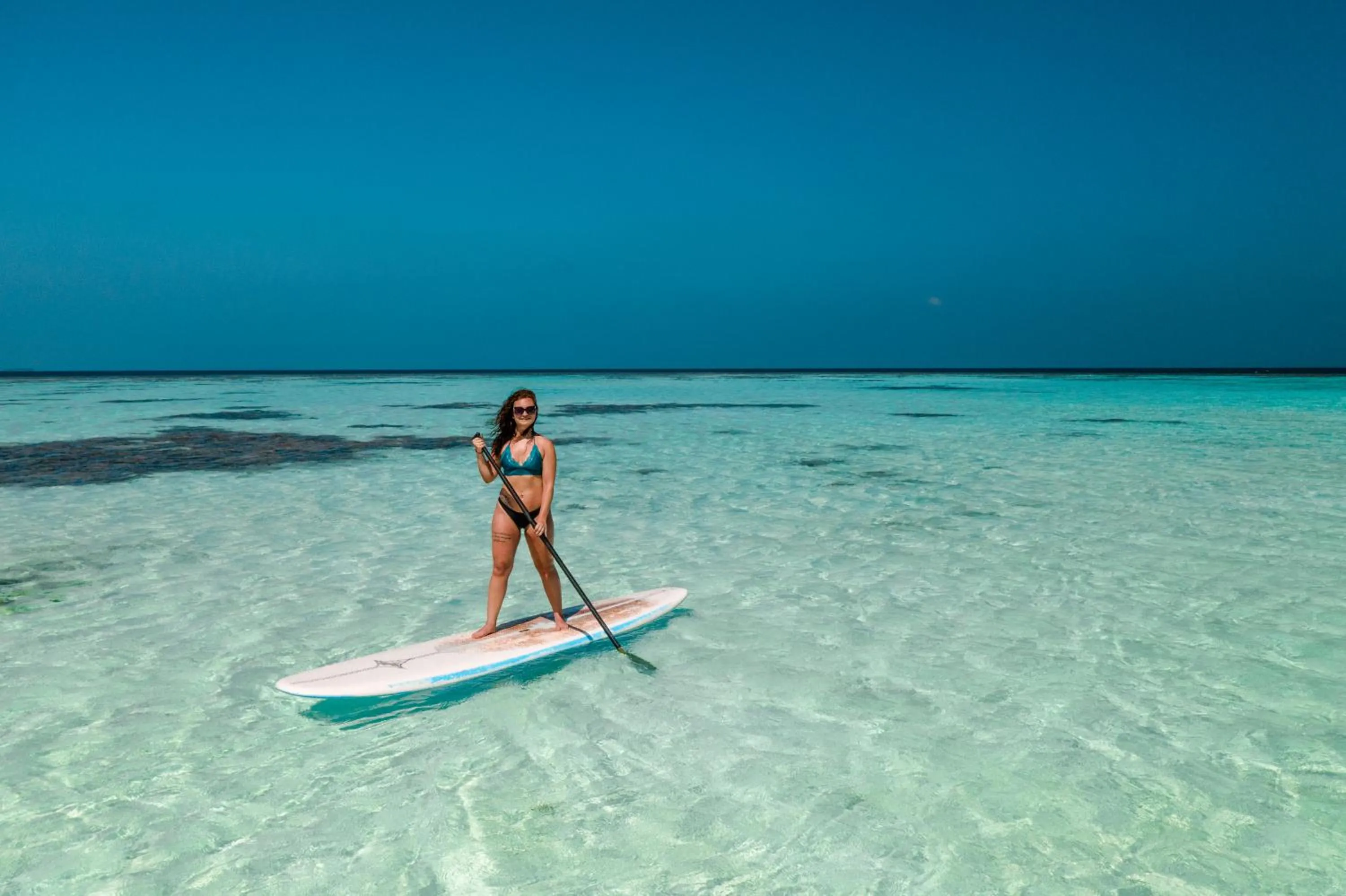 By the shade Maldives