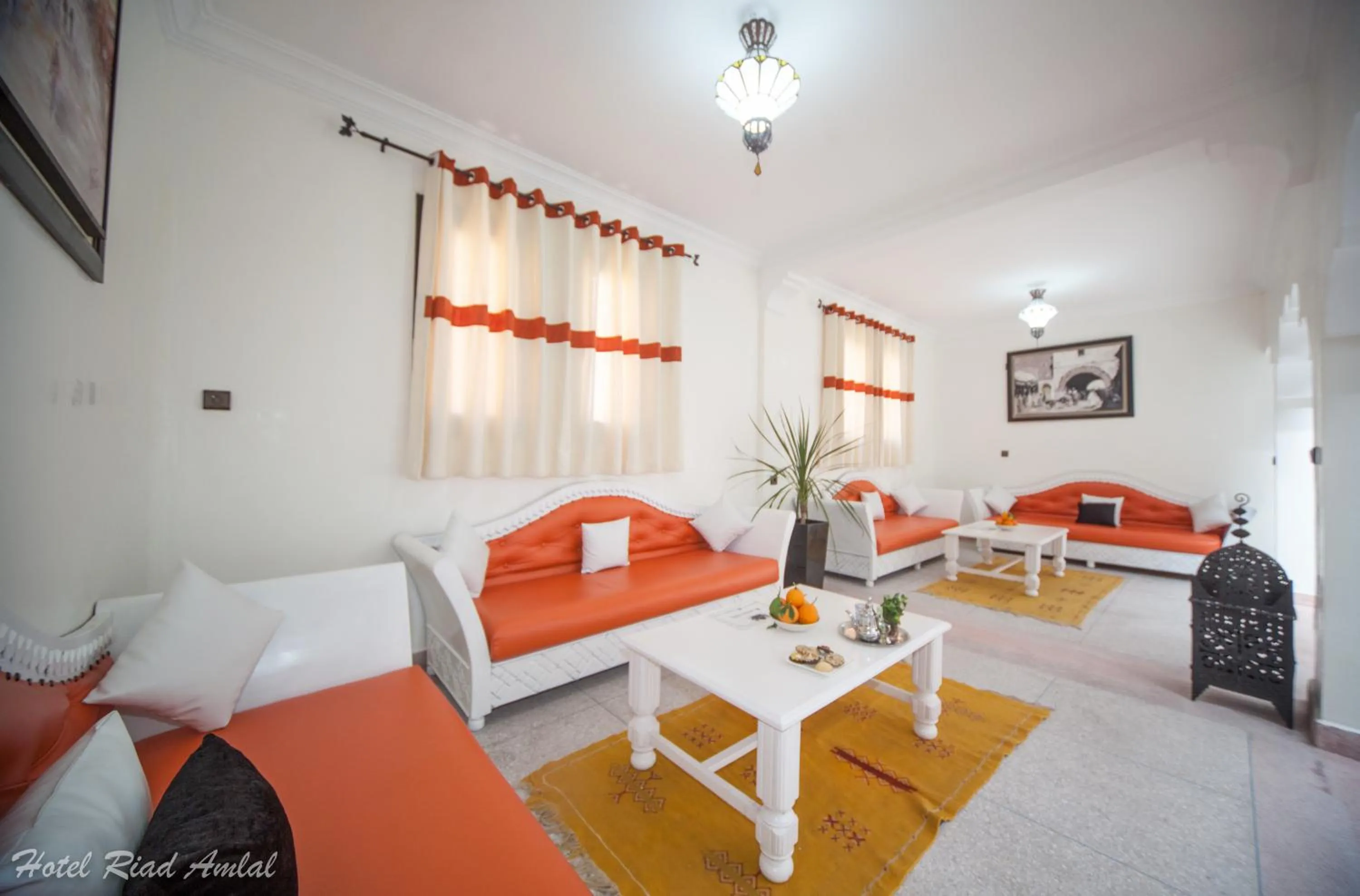 Communal lounge/ TV room in Hotel Riad Amlal