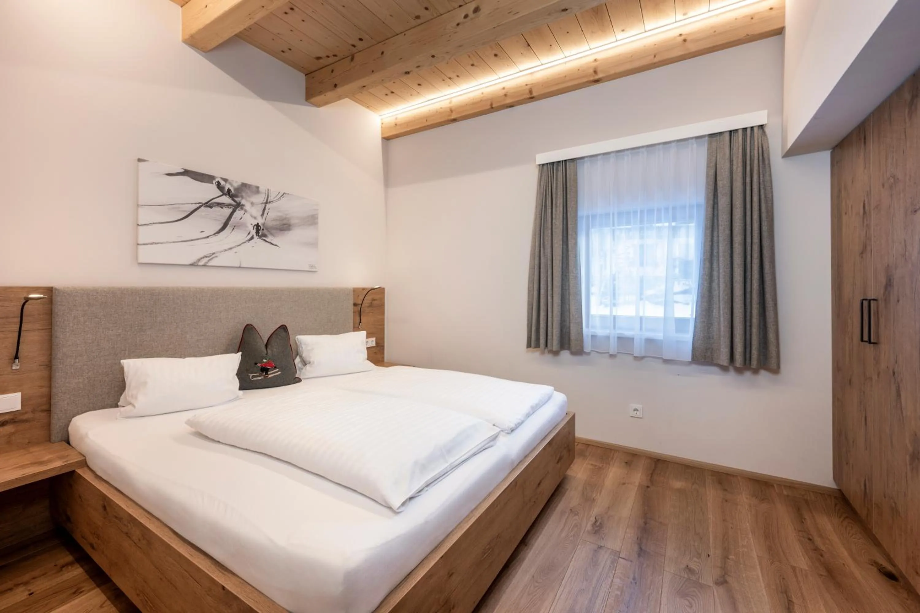 Bed in AUSTRIA APPART - natural Lifestyle Appartements auf der Piste