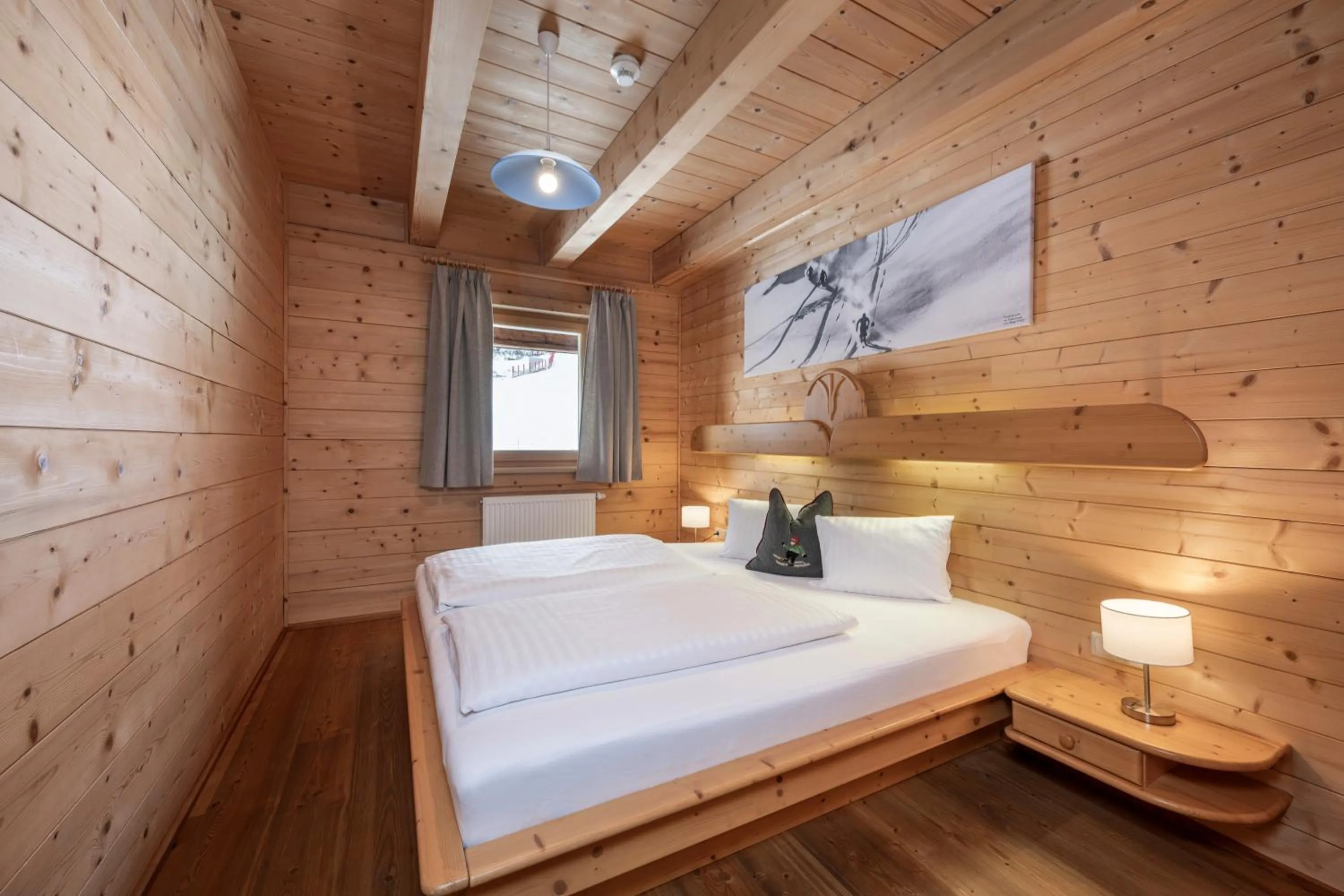 Bed in AUSTRIA APPART - natural Lifestyle Appartements auf der Piste