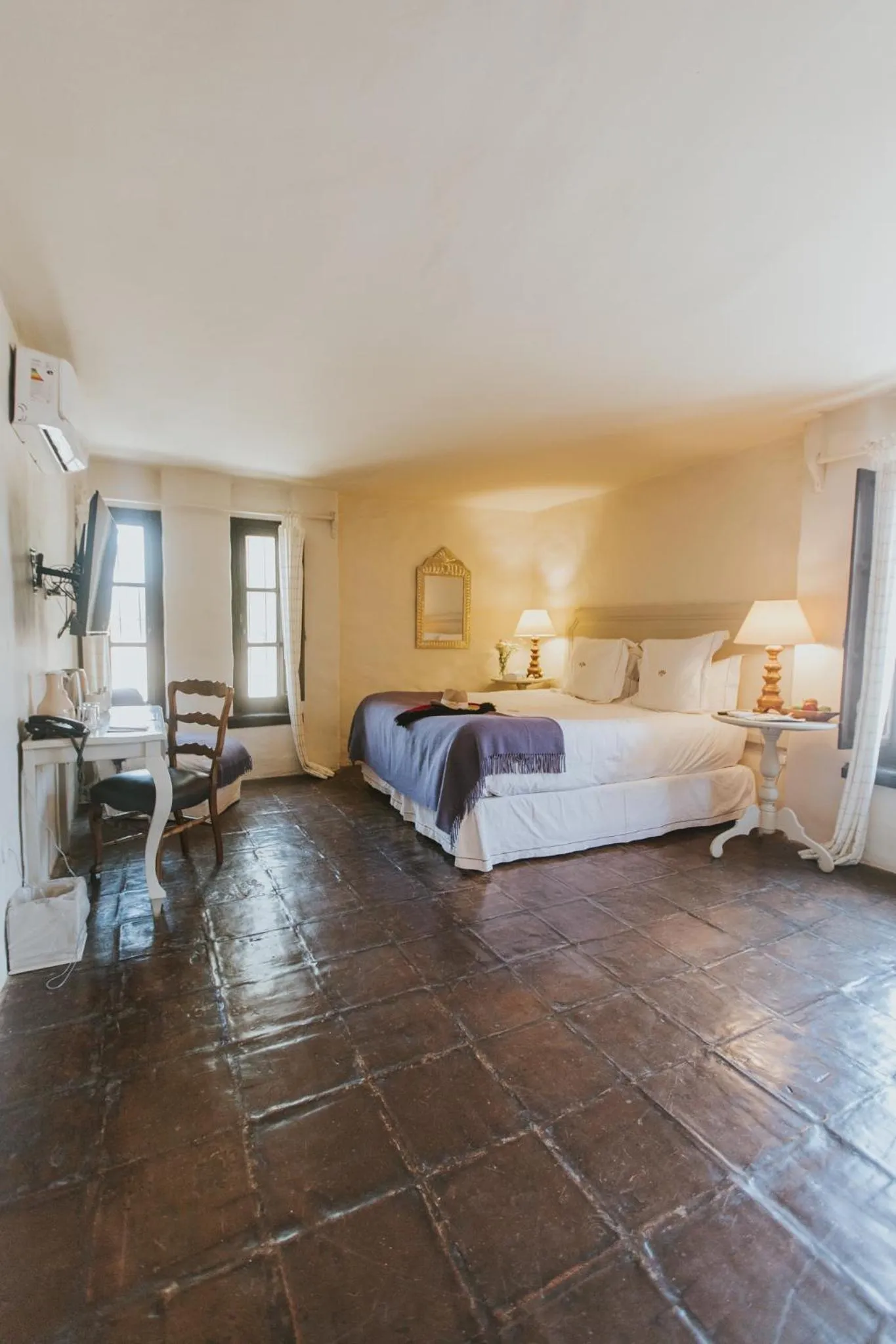 Bed in House of Jasmines Relais & Châteaux