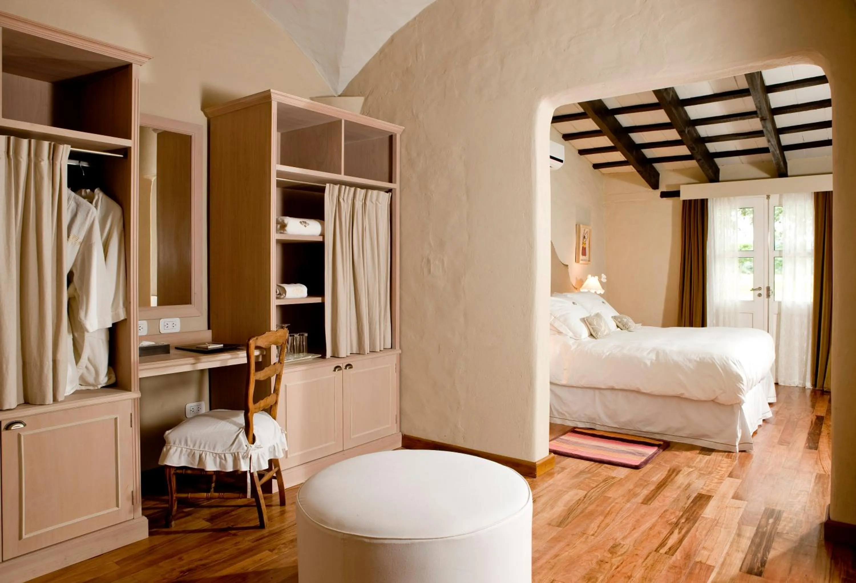 Bed in House of Jasmines Relais & Châteaux