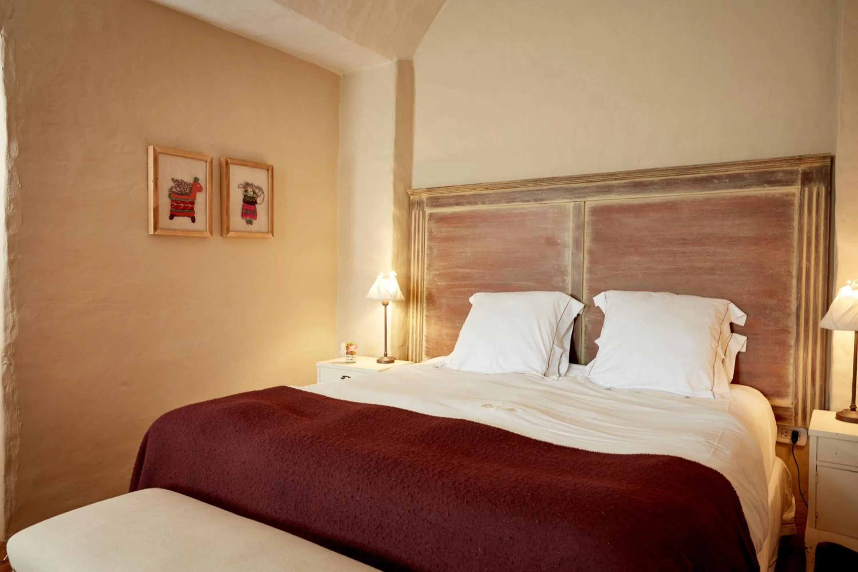 Bed in House of Jasmines Relais & Châteaux