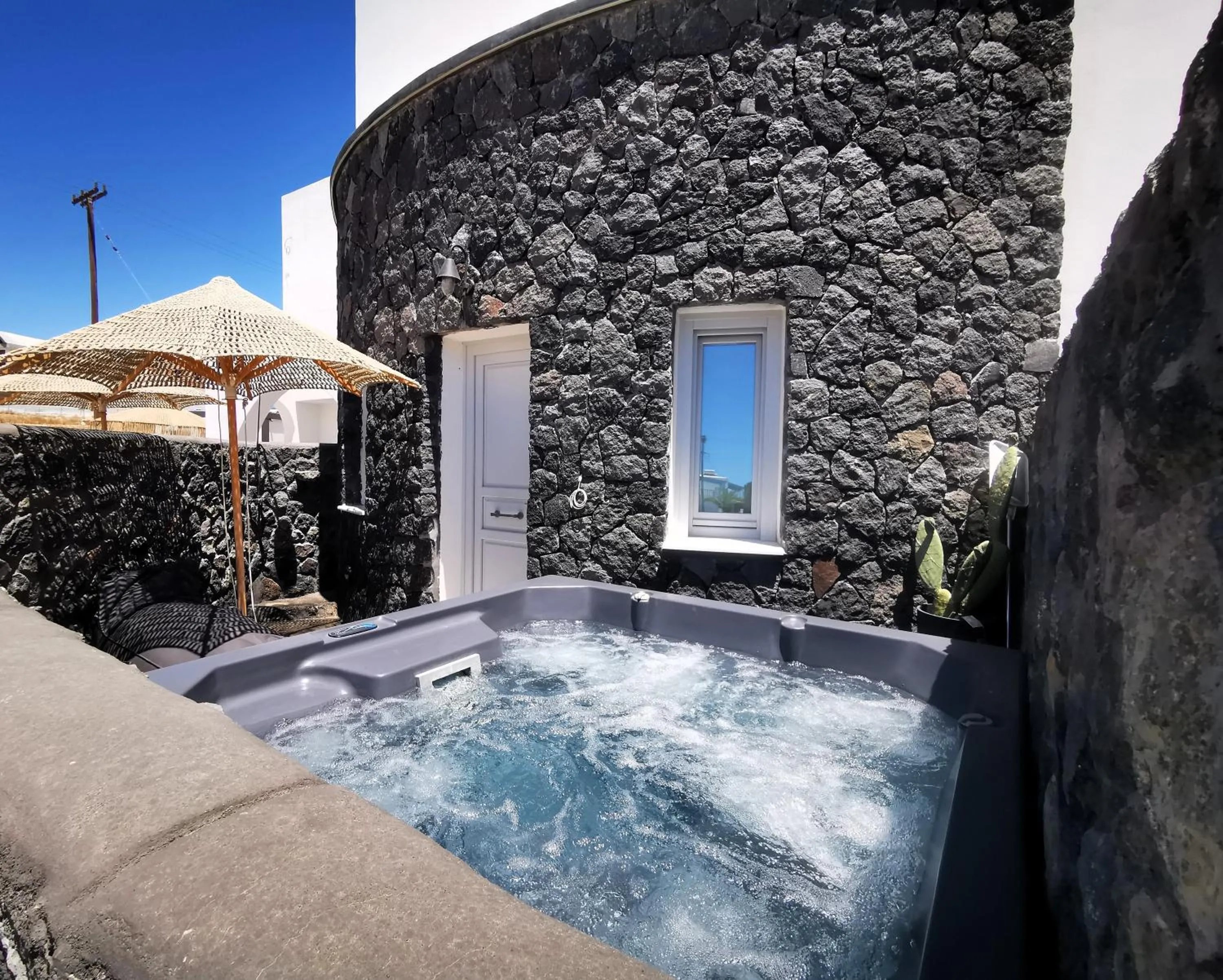 Hot Tub in Alafropetra Luxury Suites