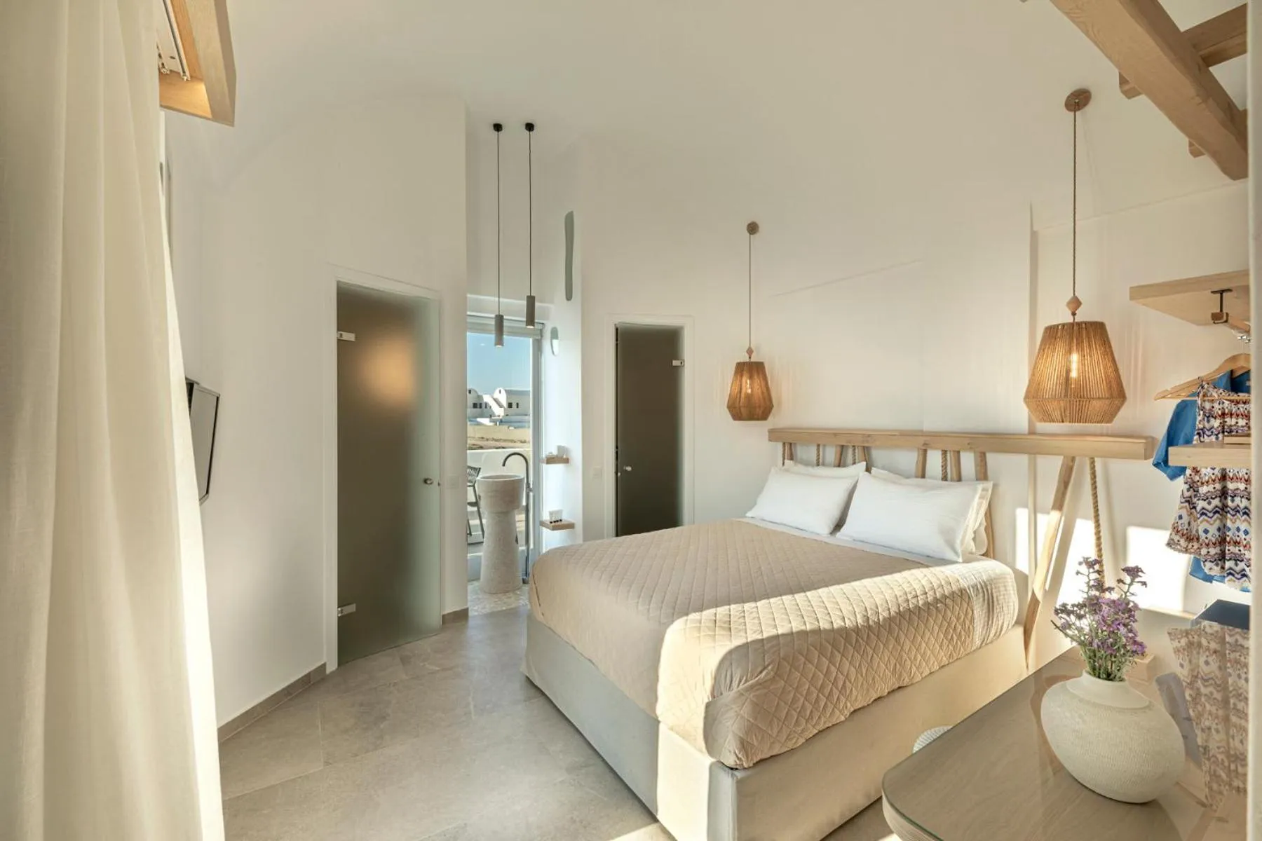 Bed in Alafropetra Luxury Suites