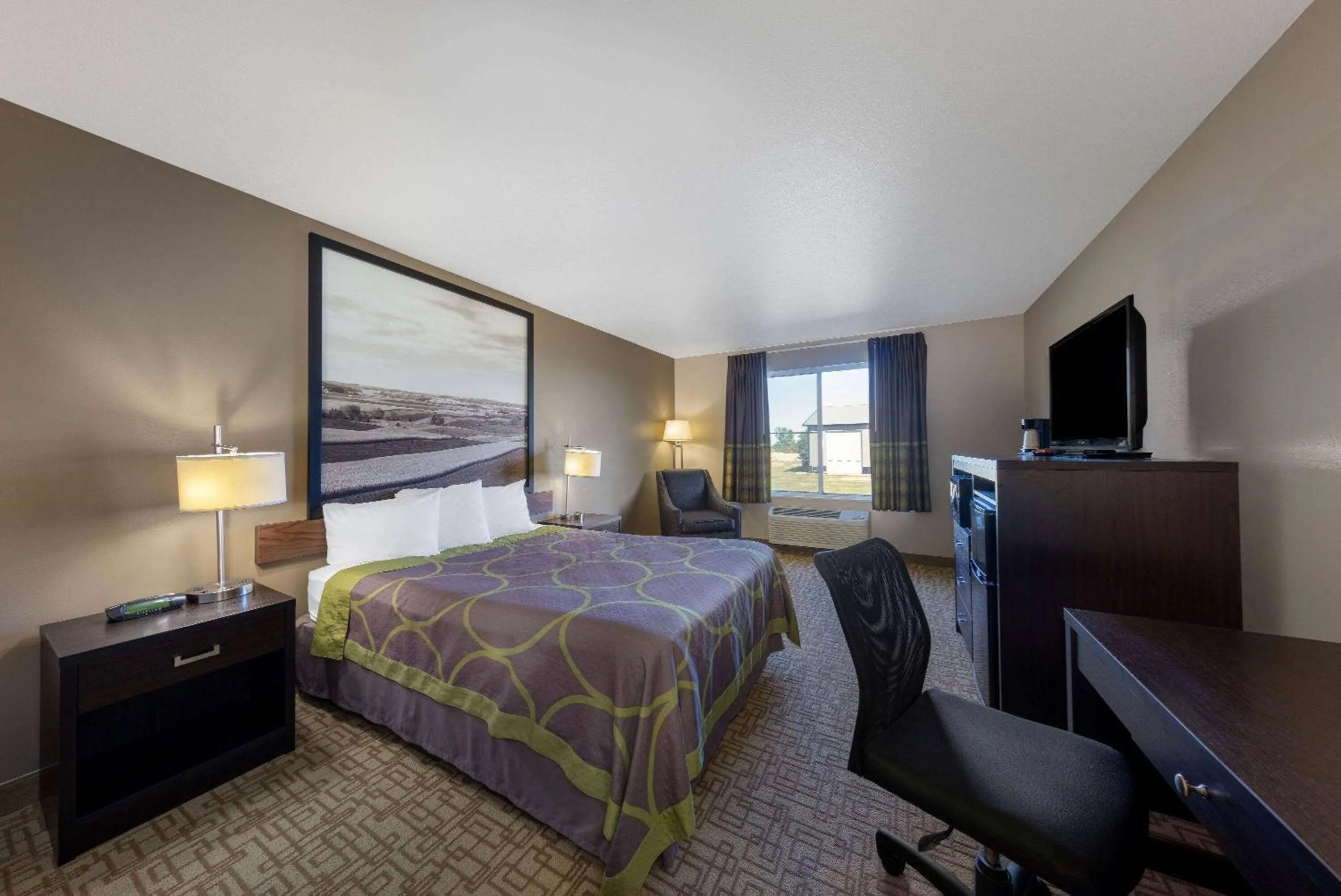 Photo of the whole room, Bed in Super 8 by Wyndham Jackson MN