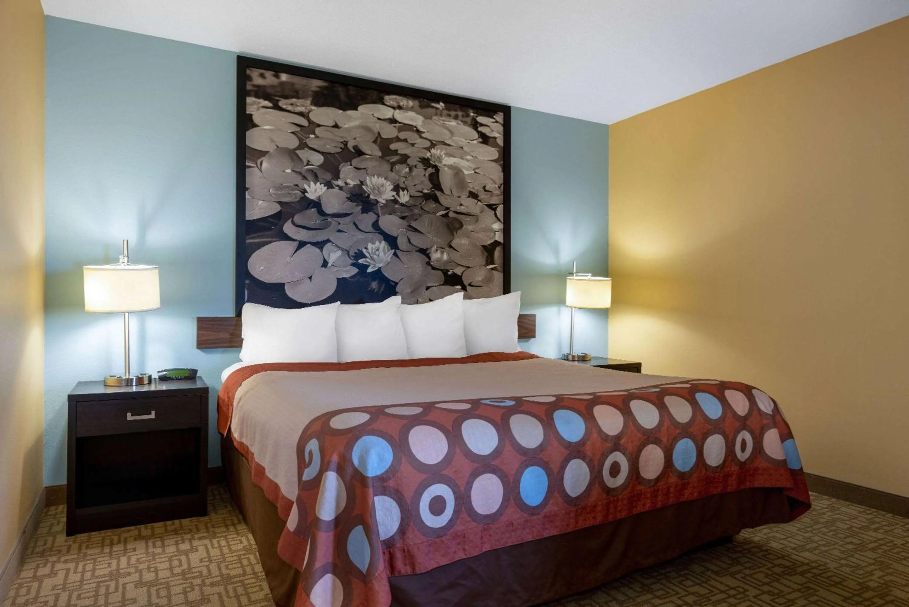 Bed in Super 8 by Wyndham Jackson MN