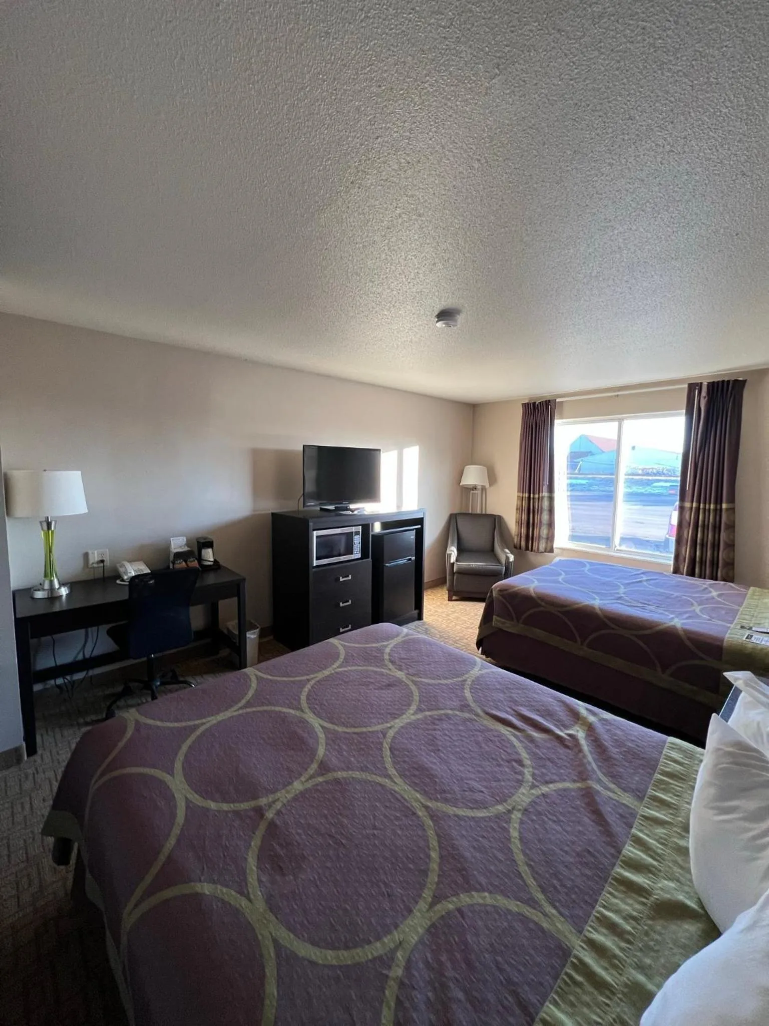 Bed in Super 8 by Wyndham Jackson MN