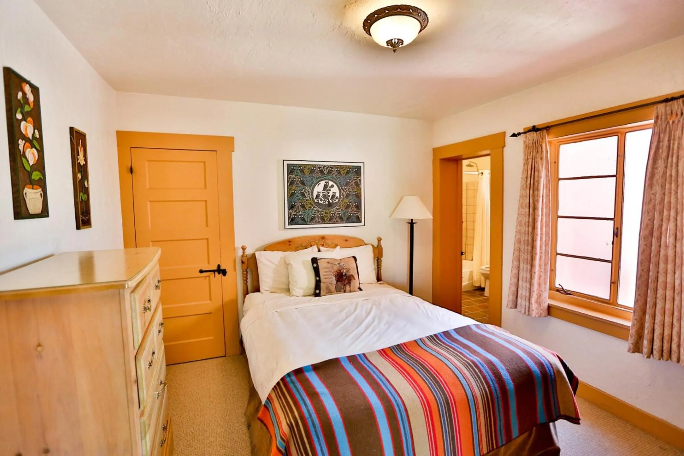 Bed in Tanque Verde Guest Ranch