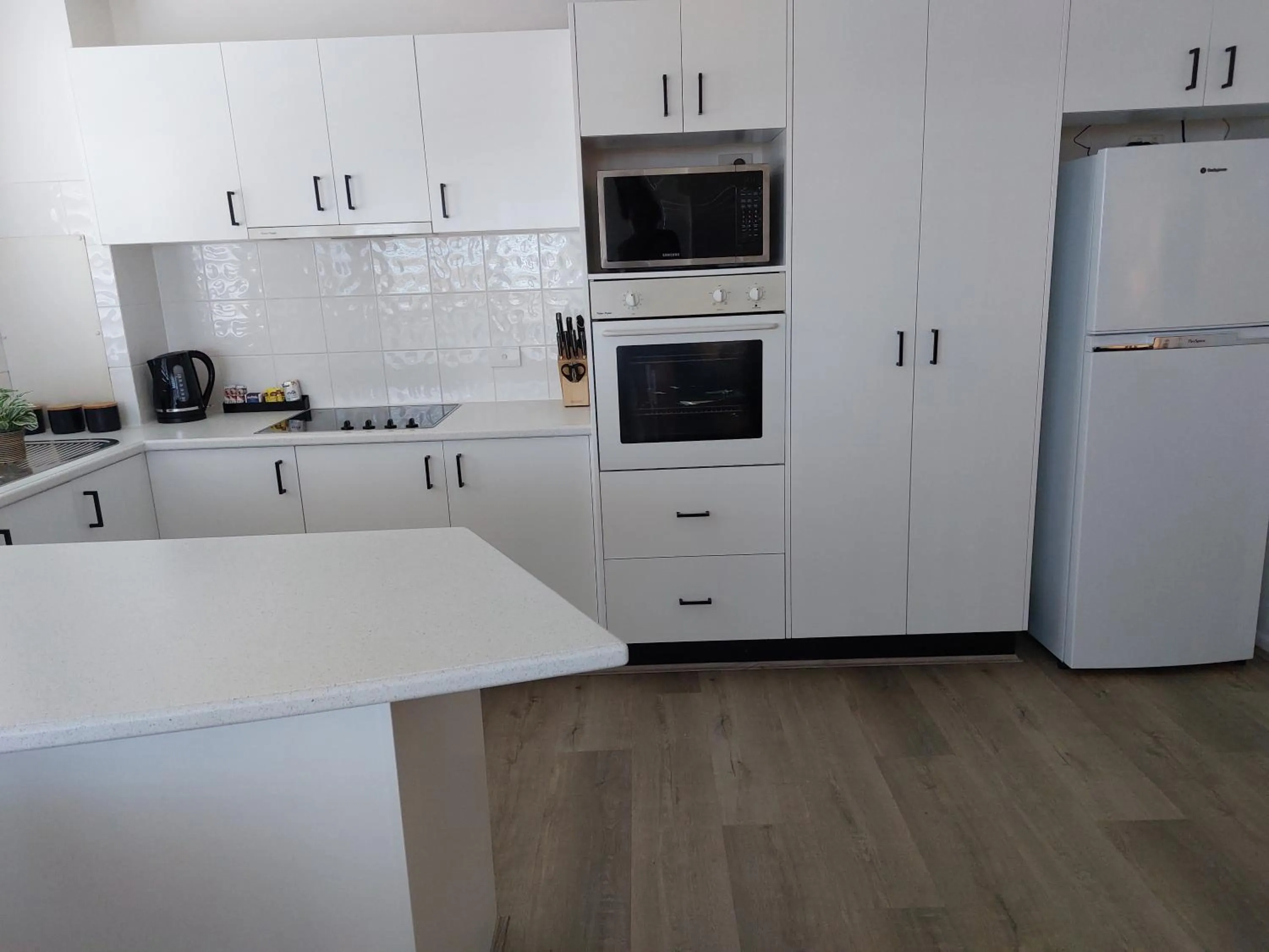 Kitchen or kitchenette in Sandy Shores Holiday Units