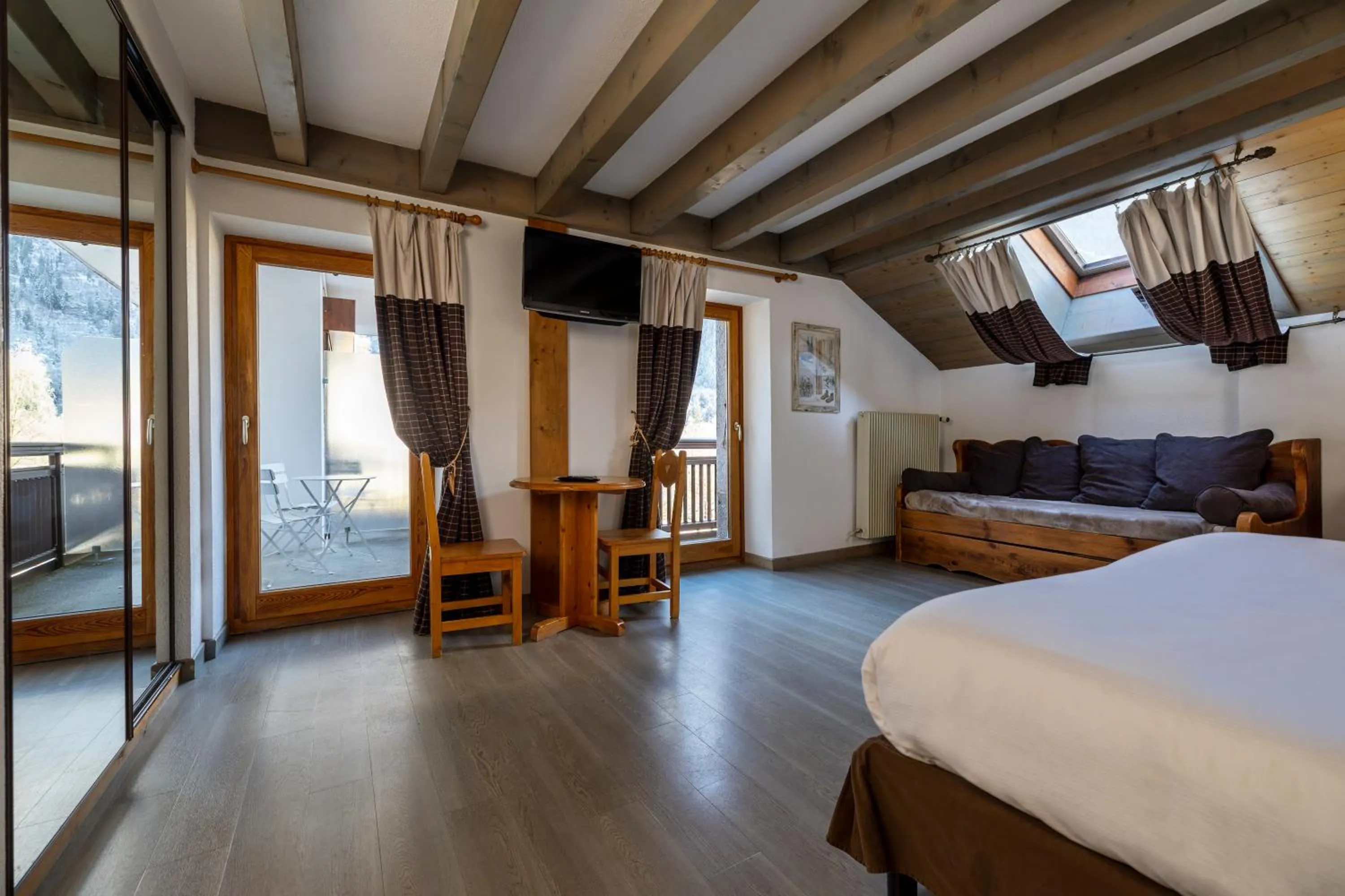 Balcony/Terrace, Bed in Hôtel de L'Arve by HappyCulture