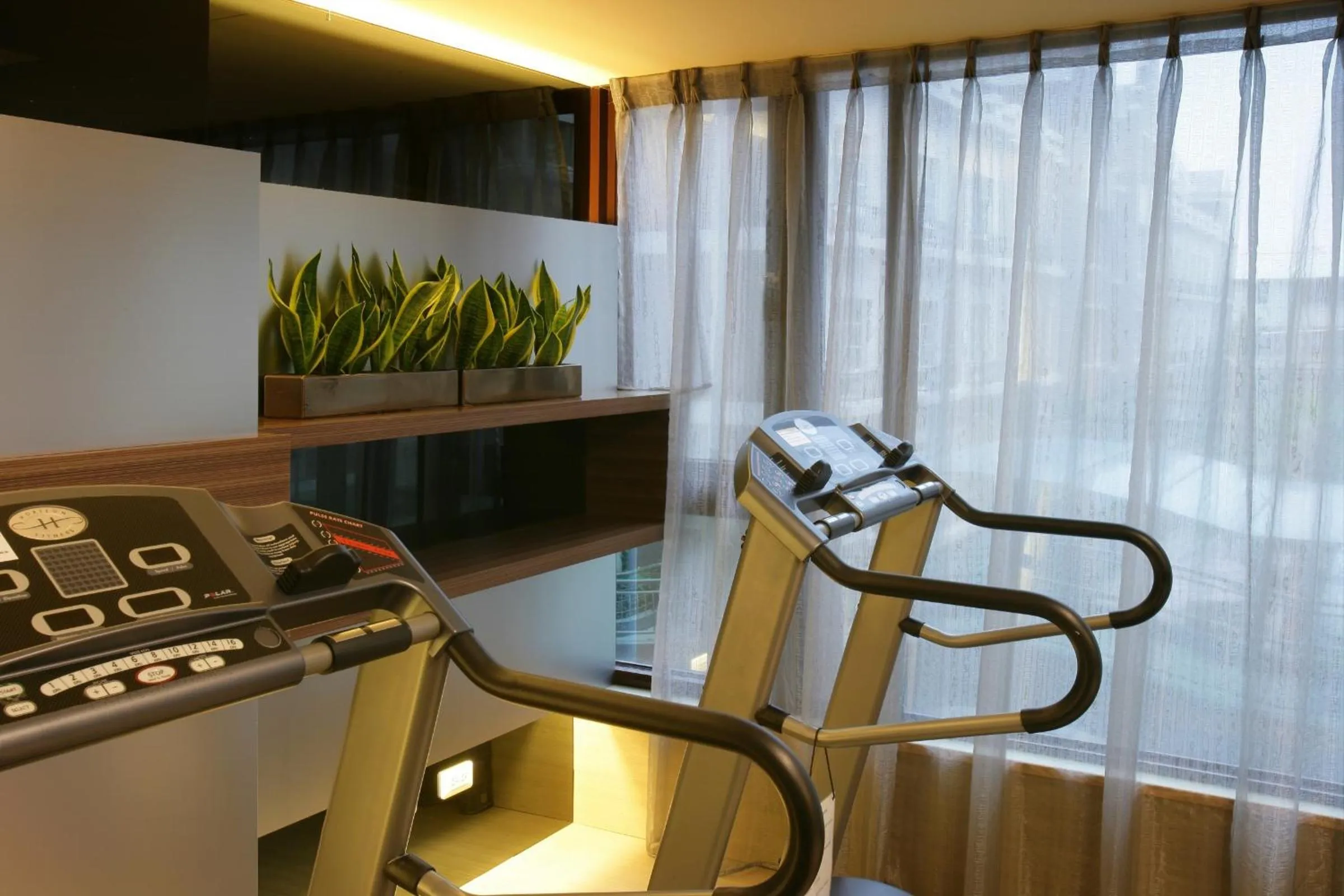 Fitness centre/facilities in In One City Inn