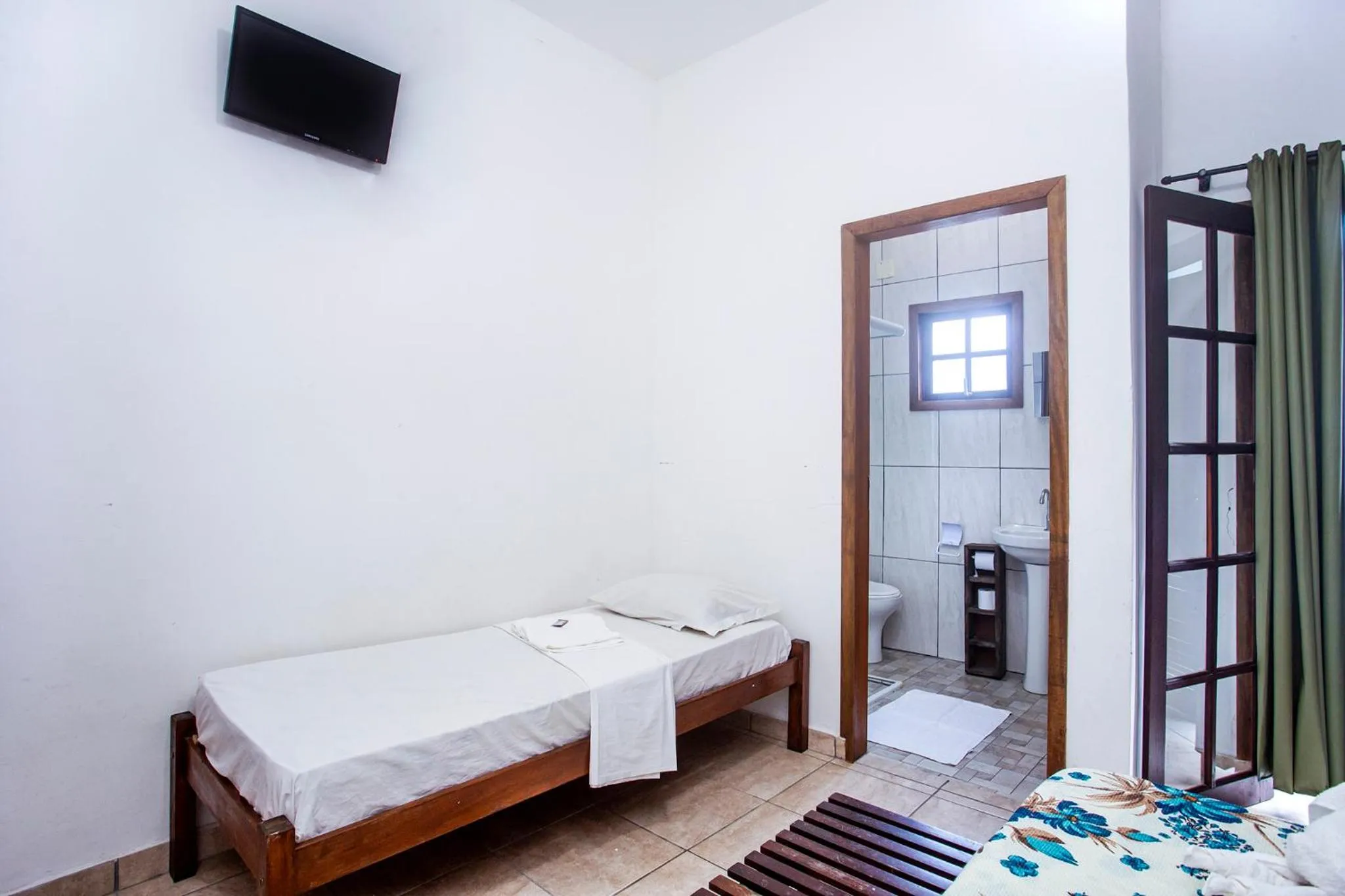 Photo of the whole room, Bed in Pousada Castelinho