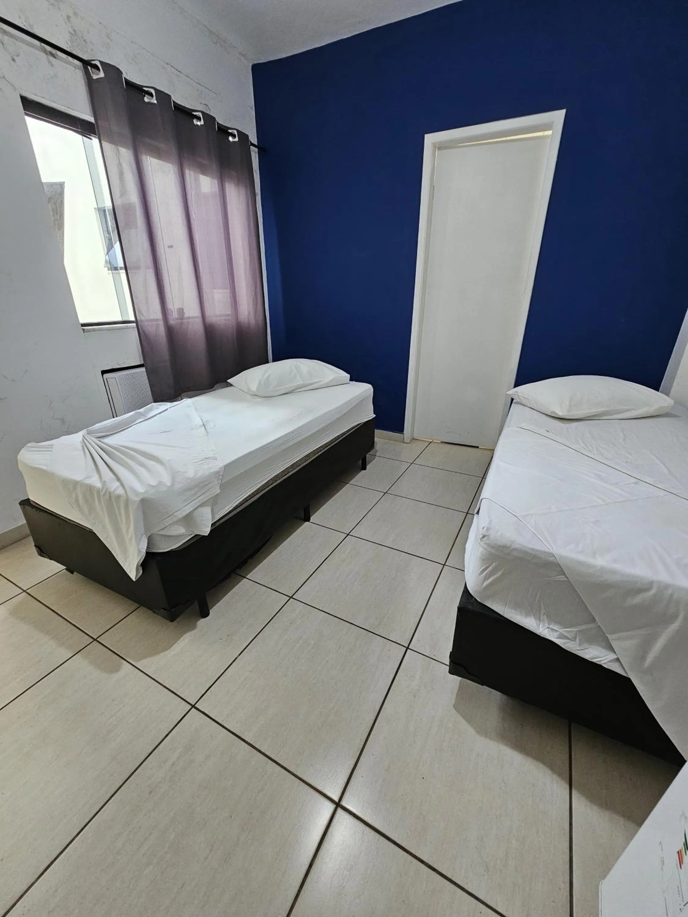 Bed in Hotel Mão de Fatima