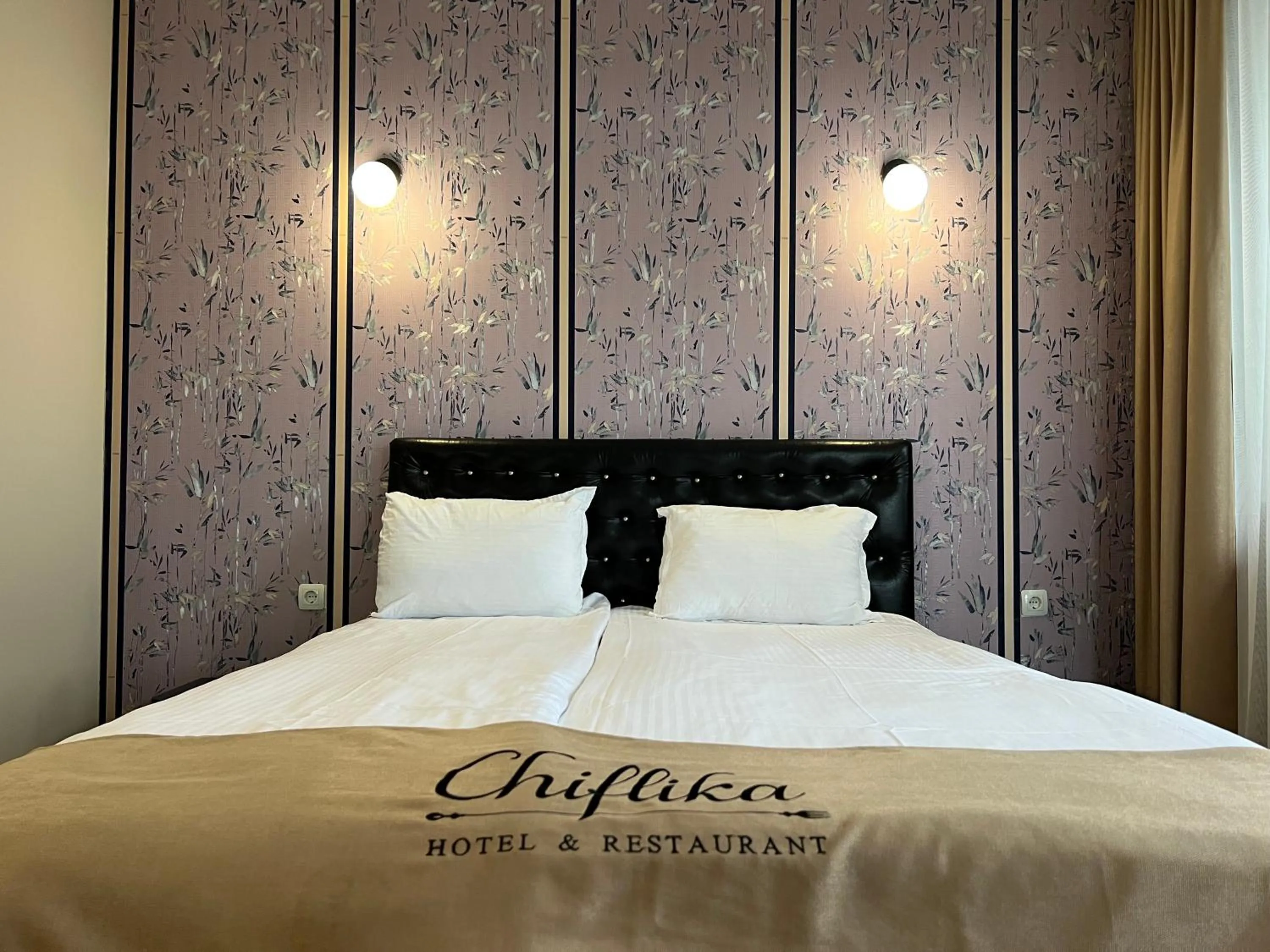 Bed in Chiflika Family Hotel