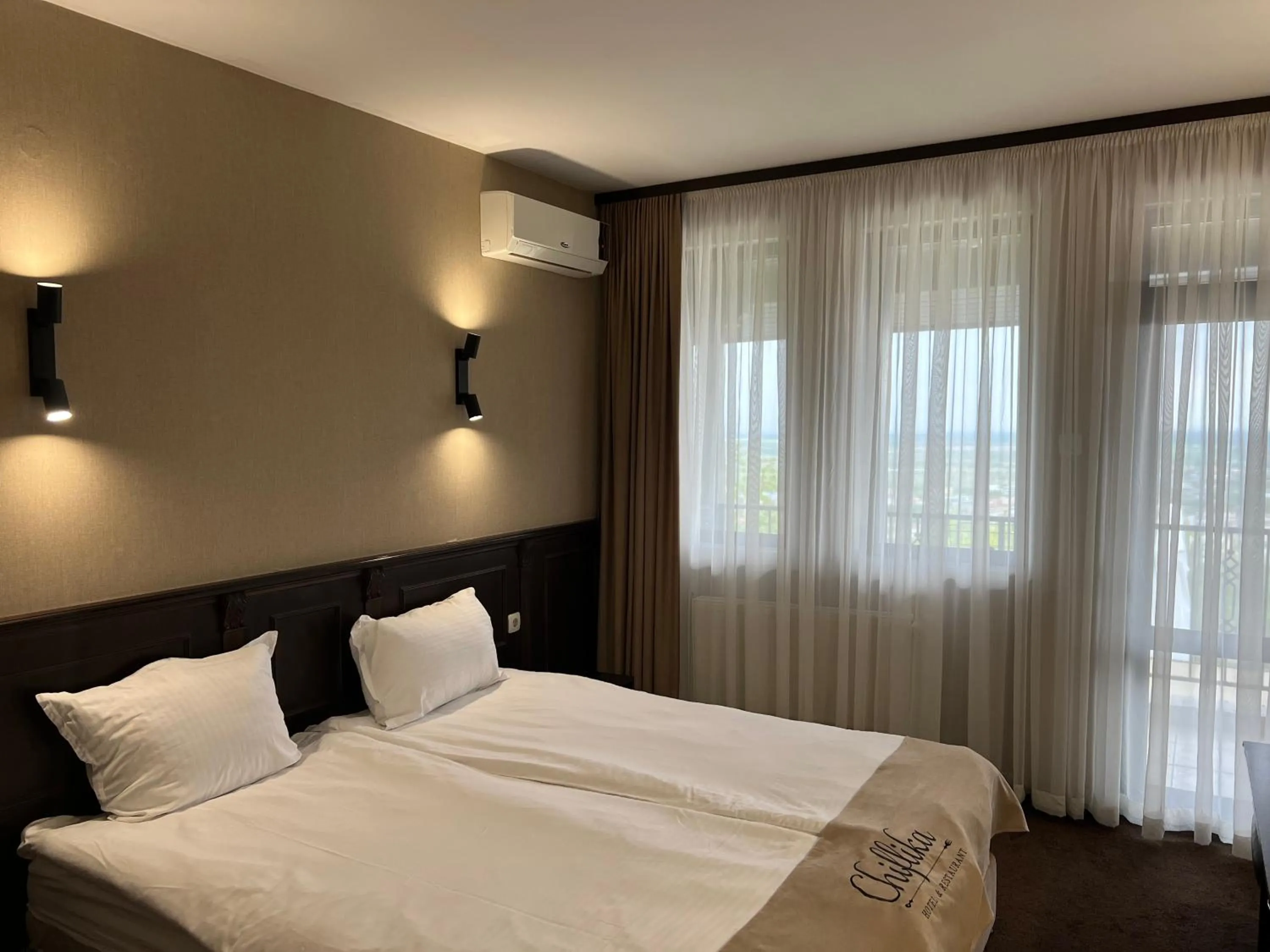 Bed in Chiflika Family Hotel