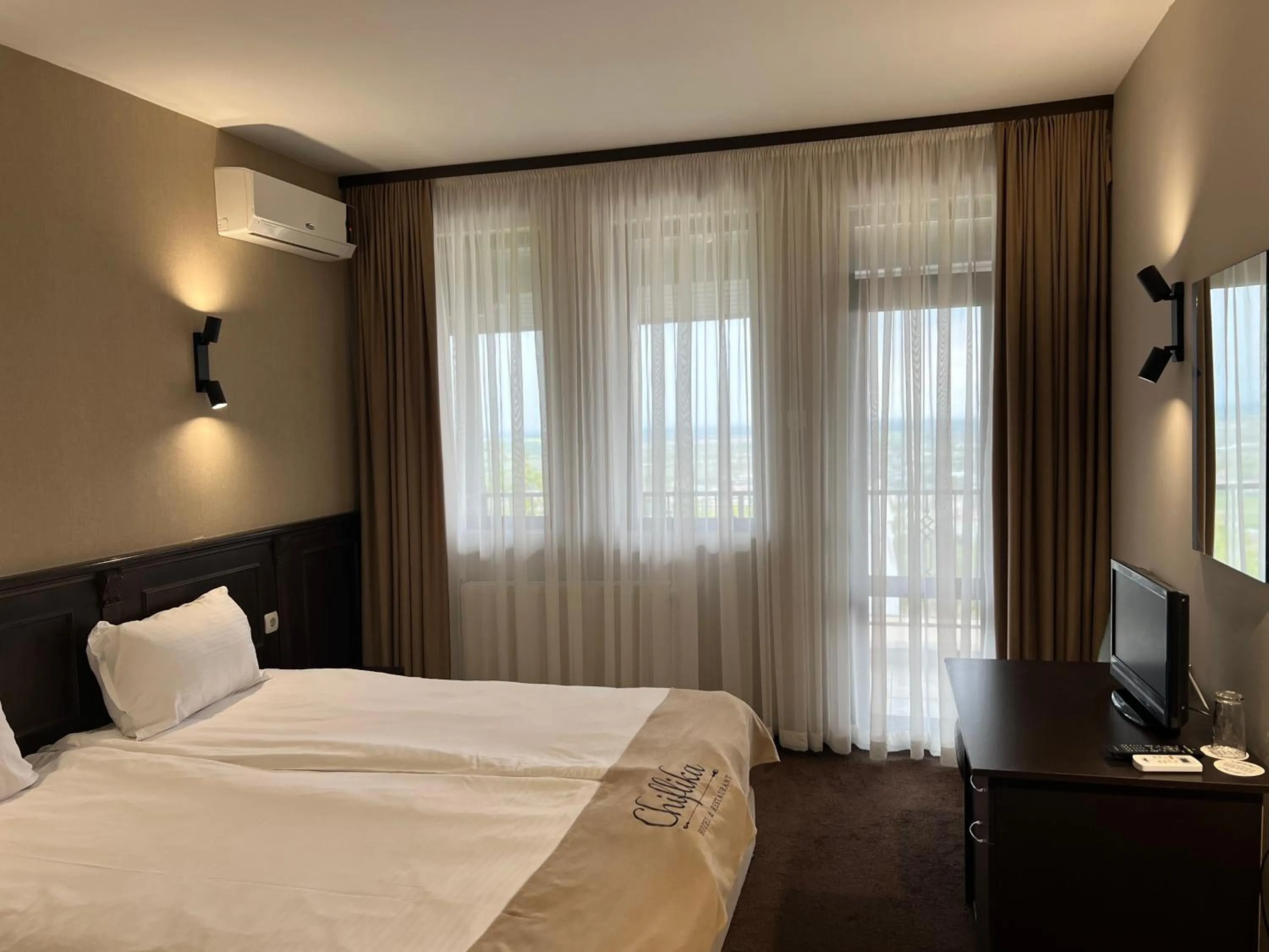 Bed in Chiflika Family Hotel