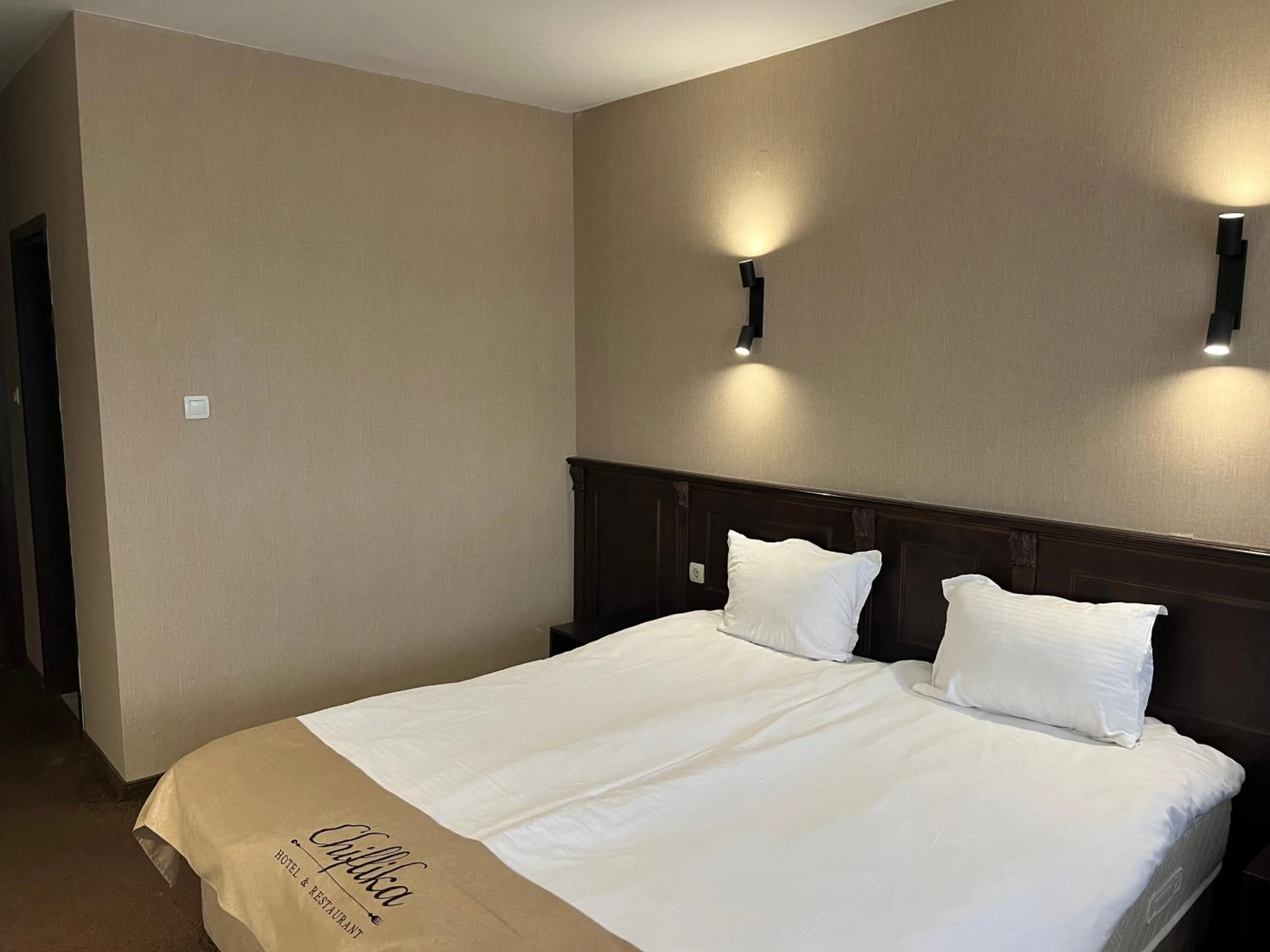 Bed in Chiflika Family Hotel