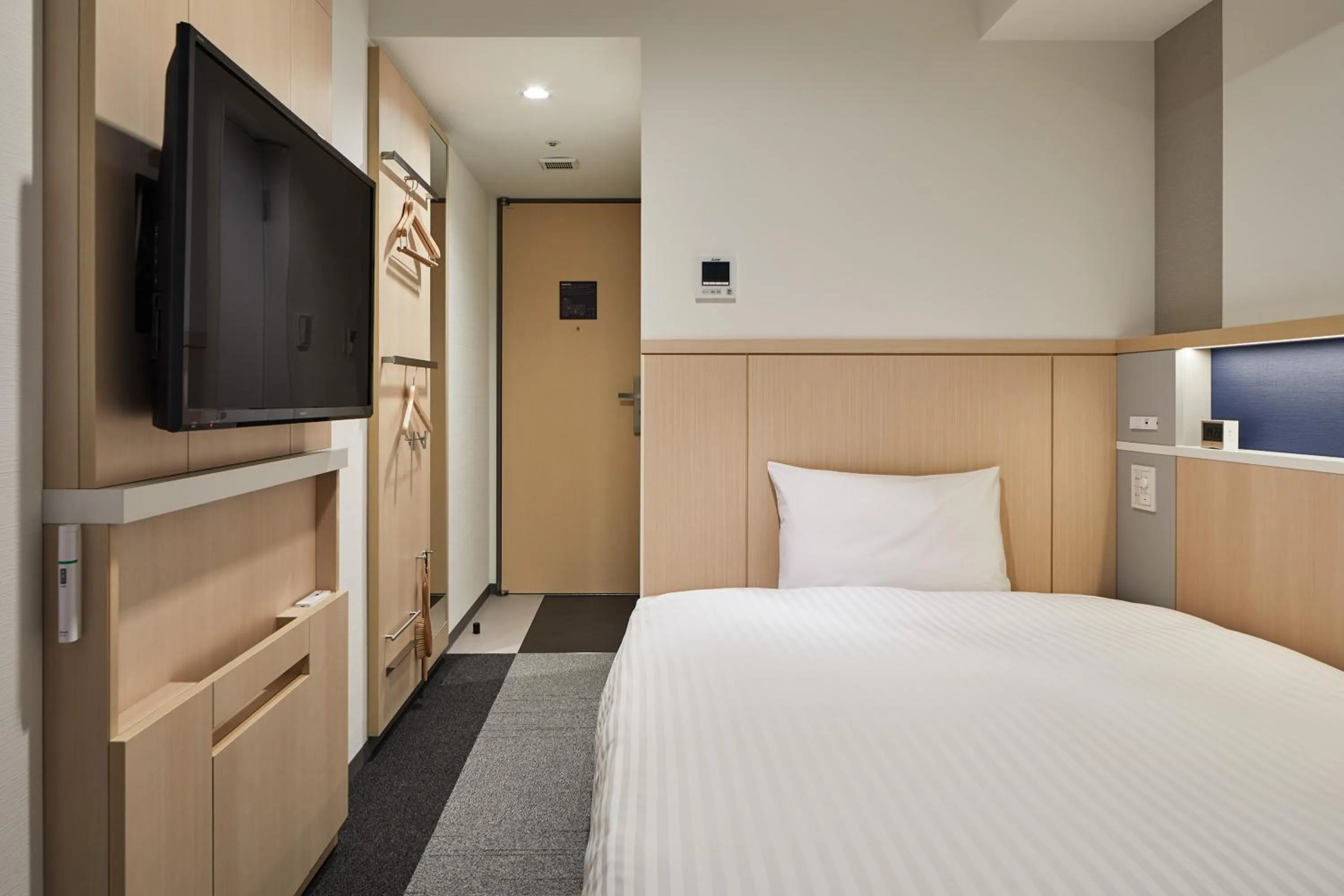 Bed in Via Inn Prime Shinsaibashi Yotsubashi