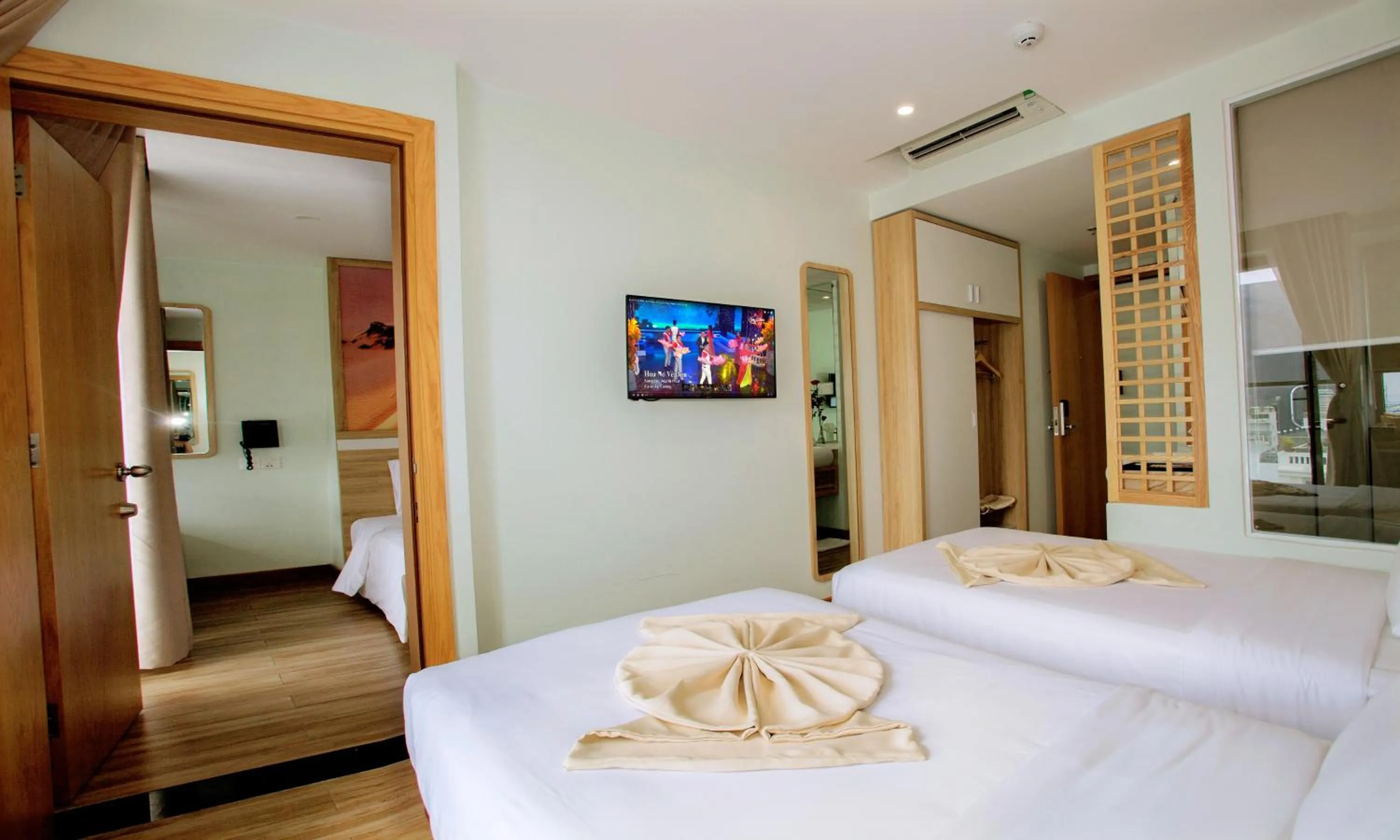 Bed in Royal HPM Hotel