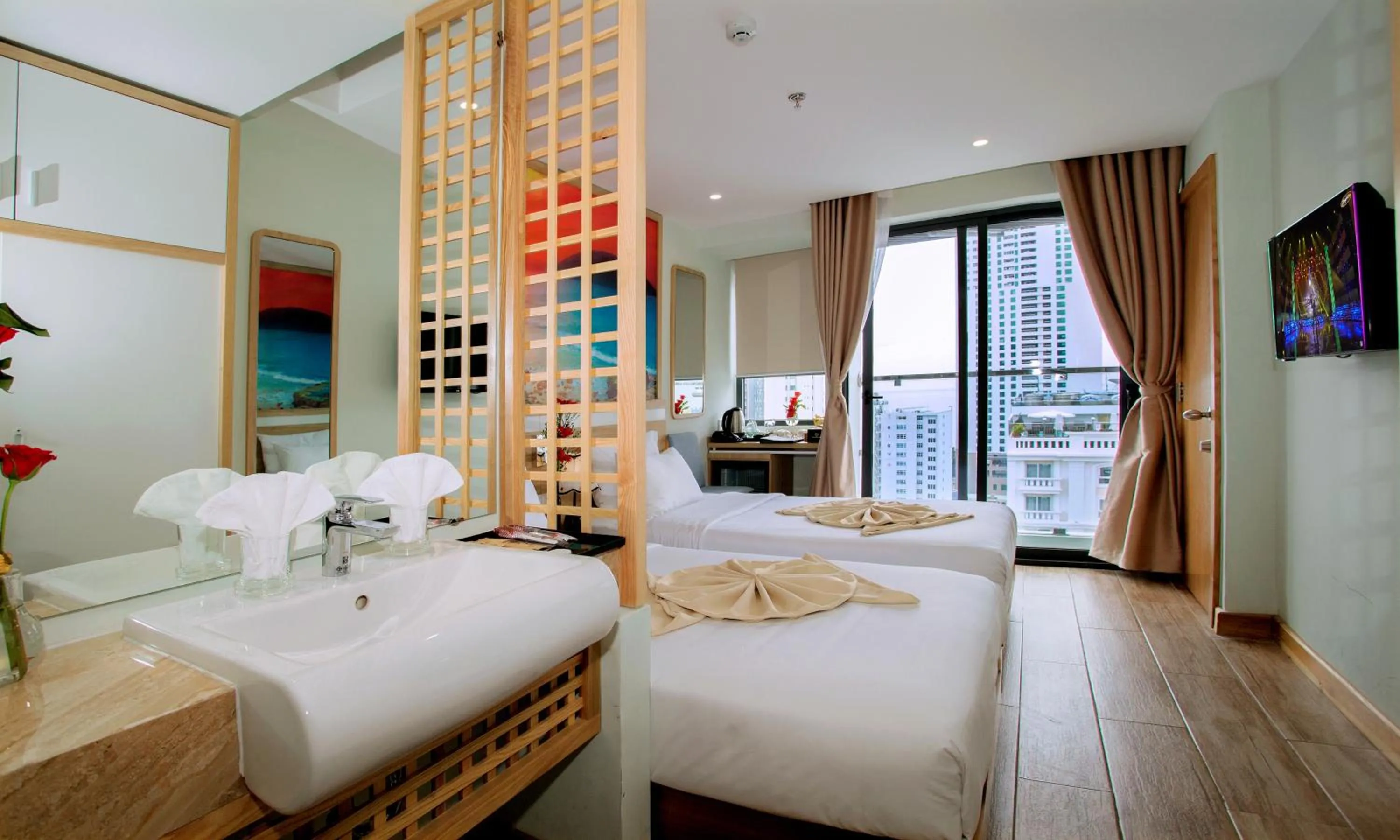 Bed in Royal HPM Hotel