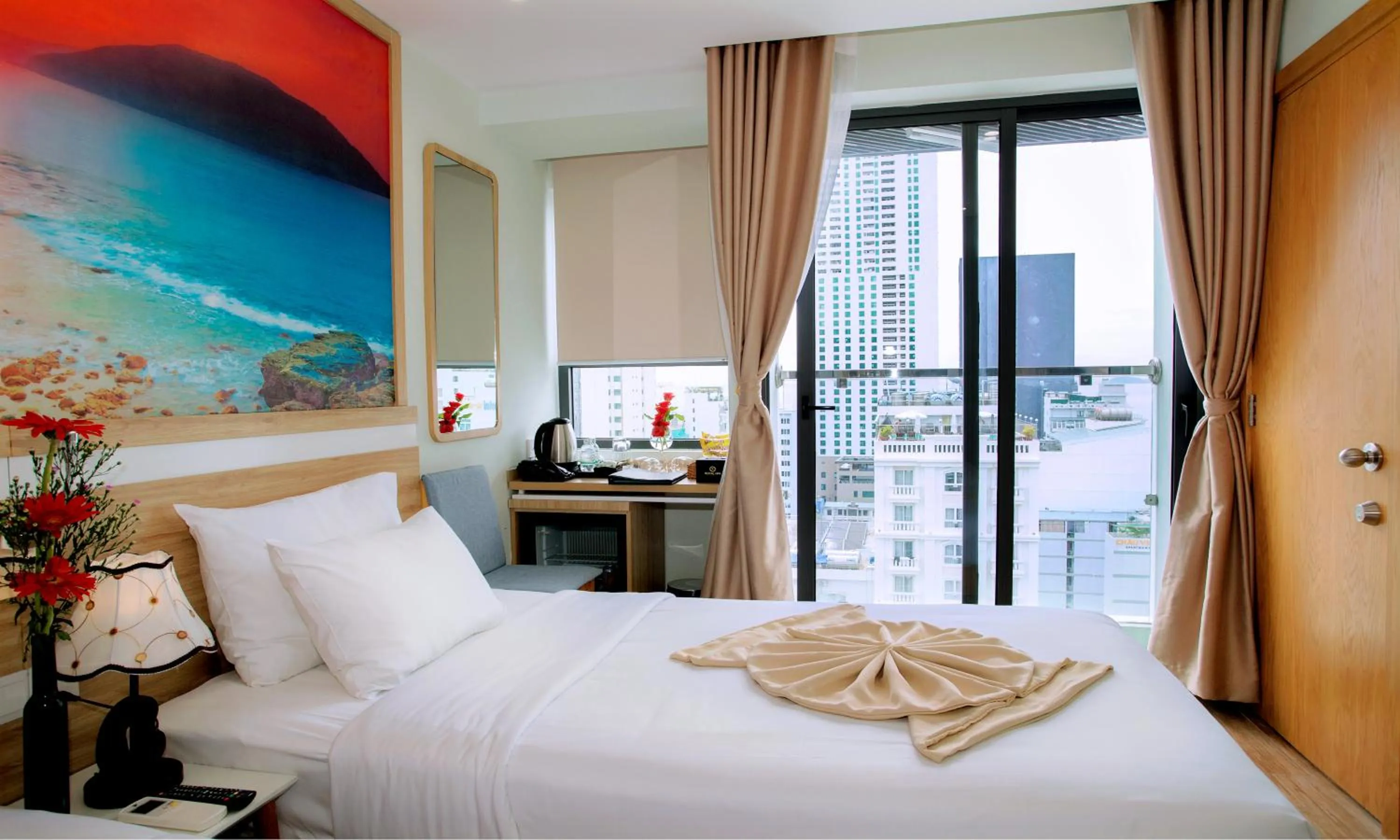 Bed in Royal HPM Hotel