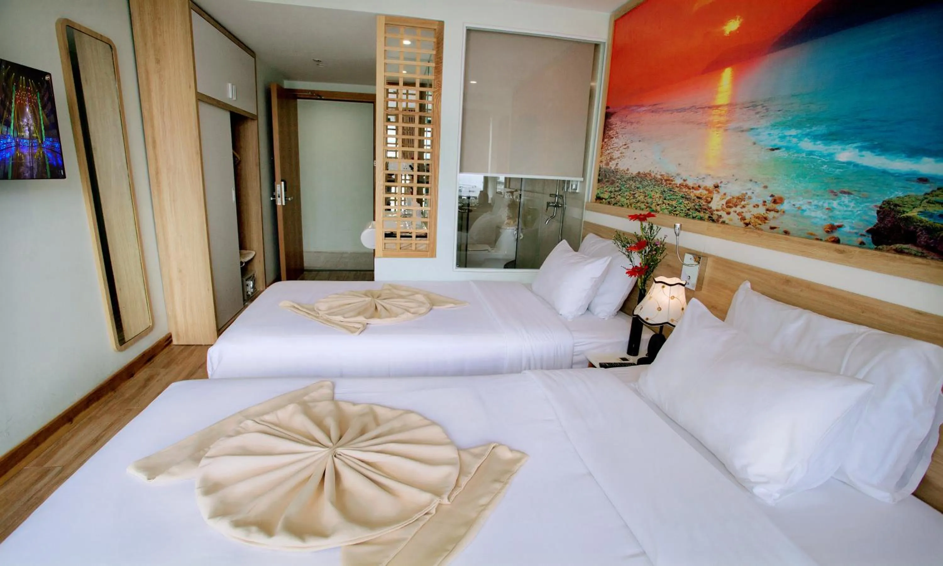 Bed in Royal HPM Hotel