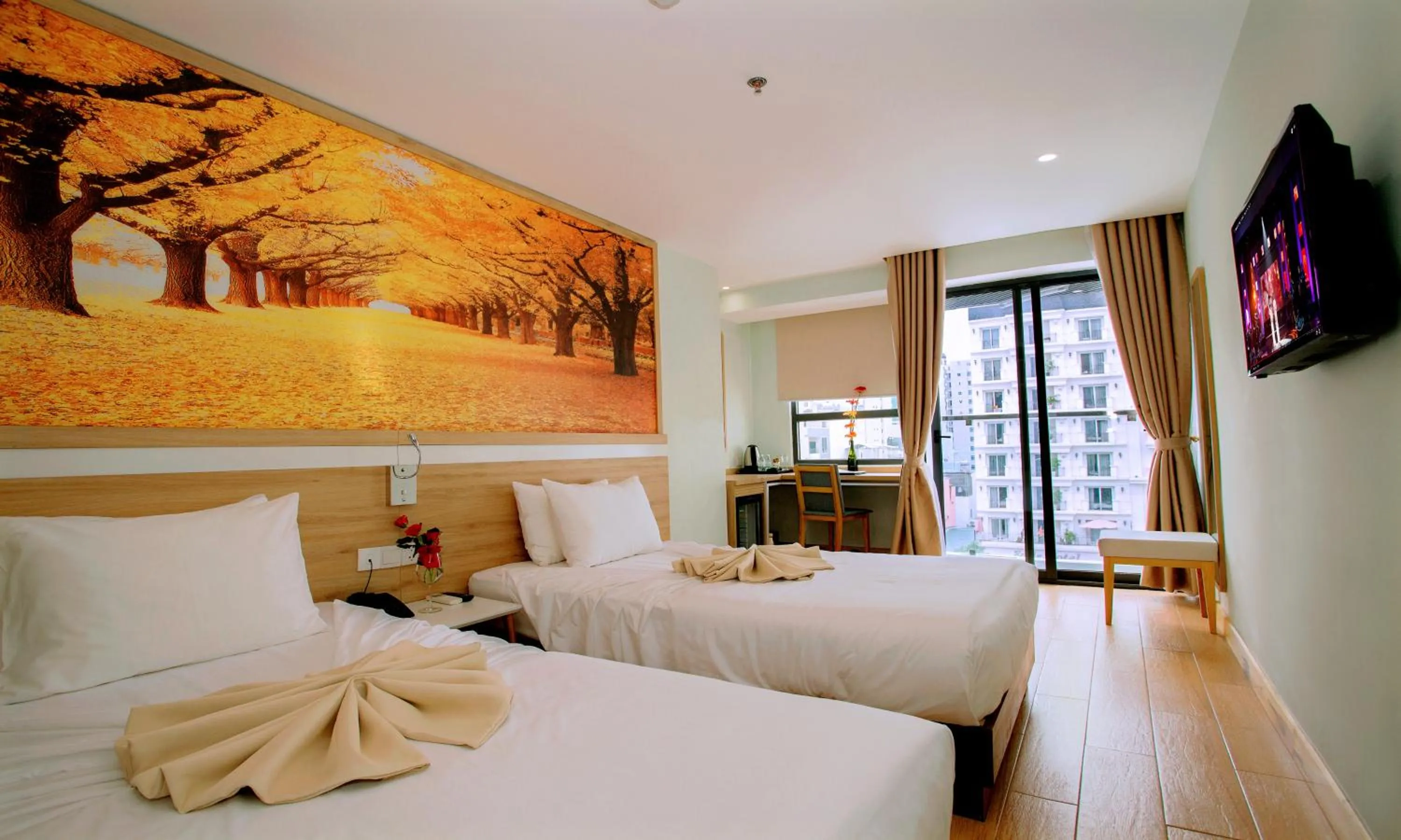 Bed in Royal HPM Hotel