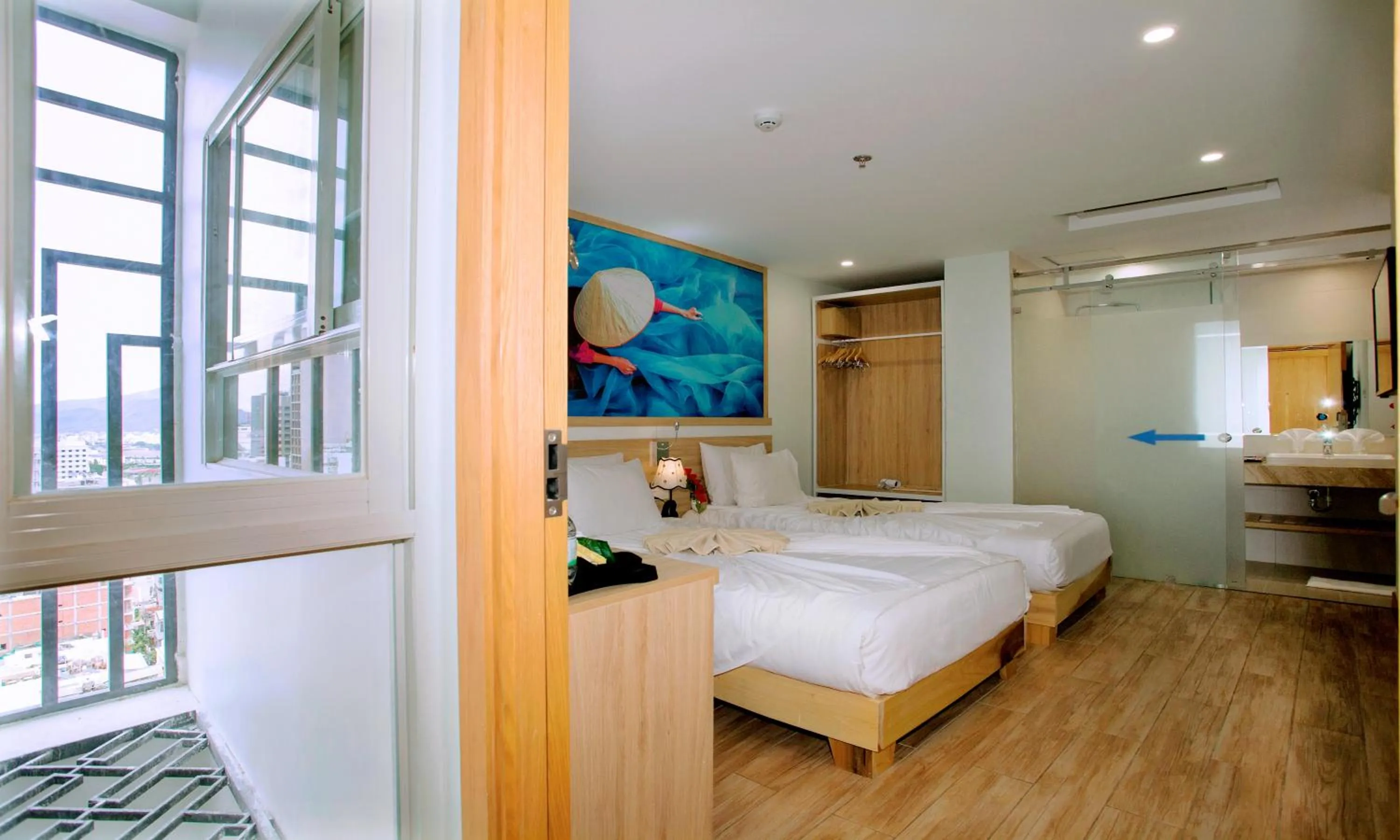 Bed in Royal HPM Hotel