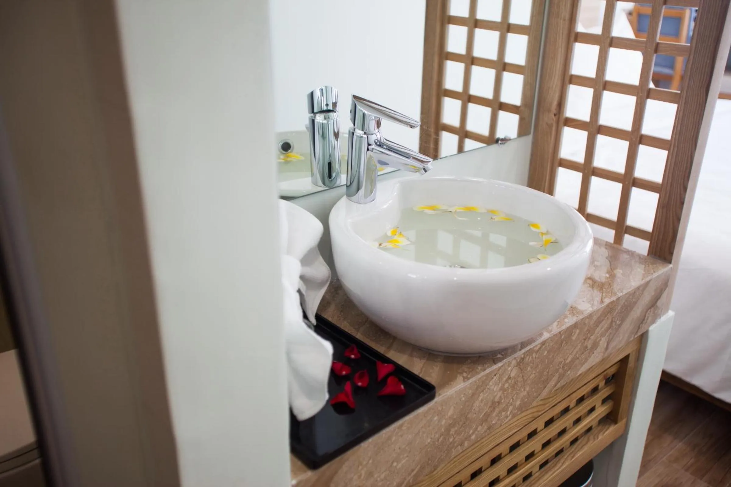 Bed in Royal HPM Hotel