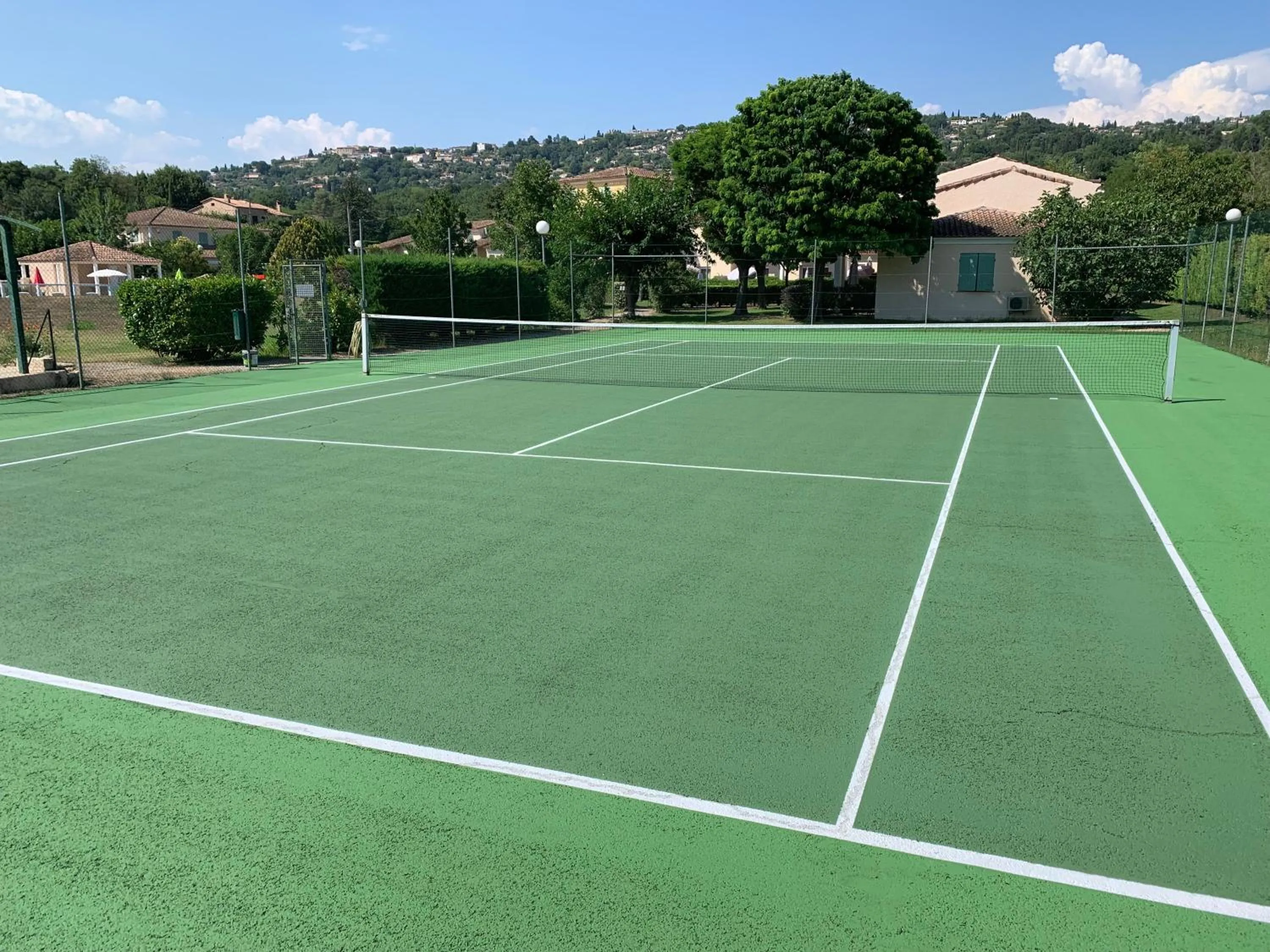 Tennis court in Le Champ d'Eysson Aparthotel