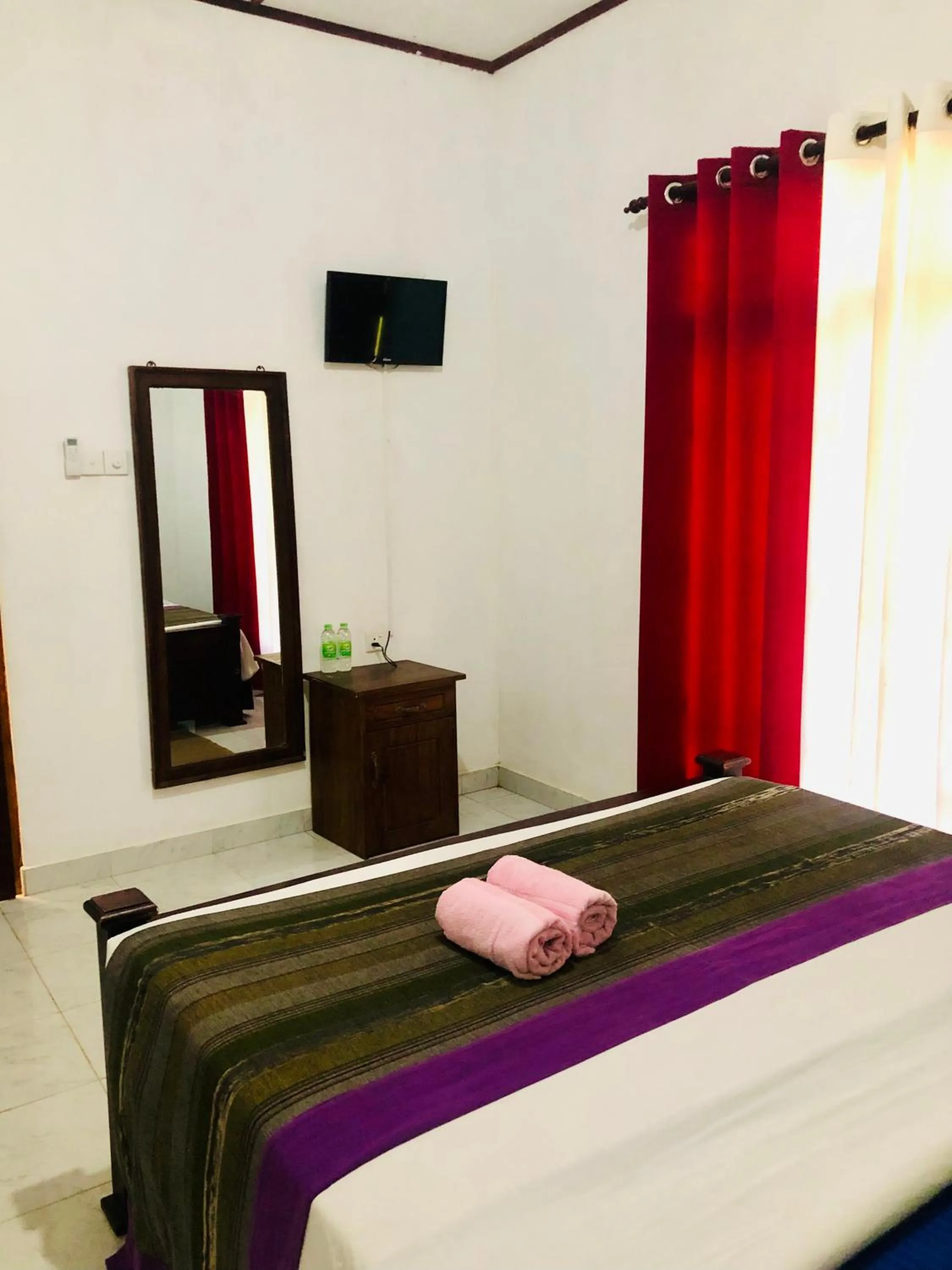 Bed in Bangalawa Resort