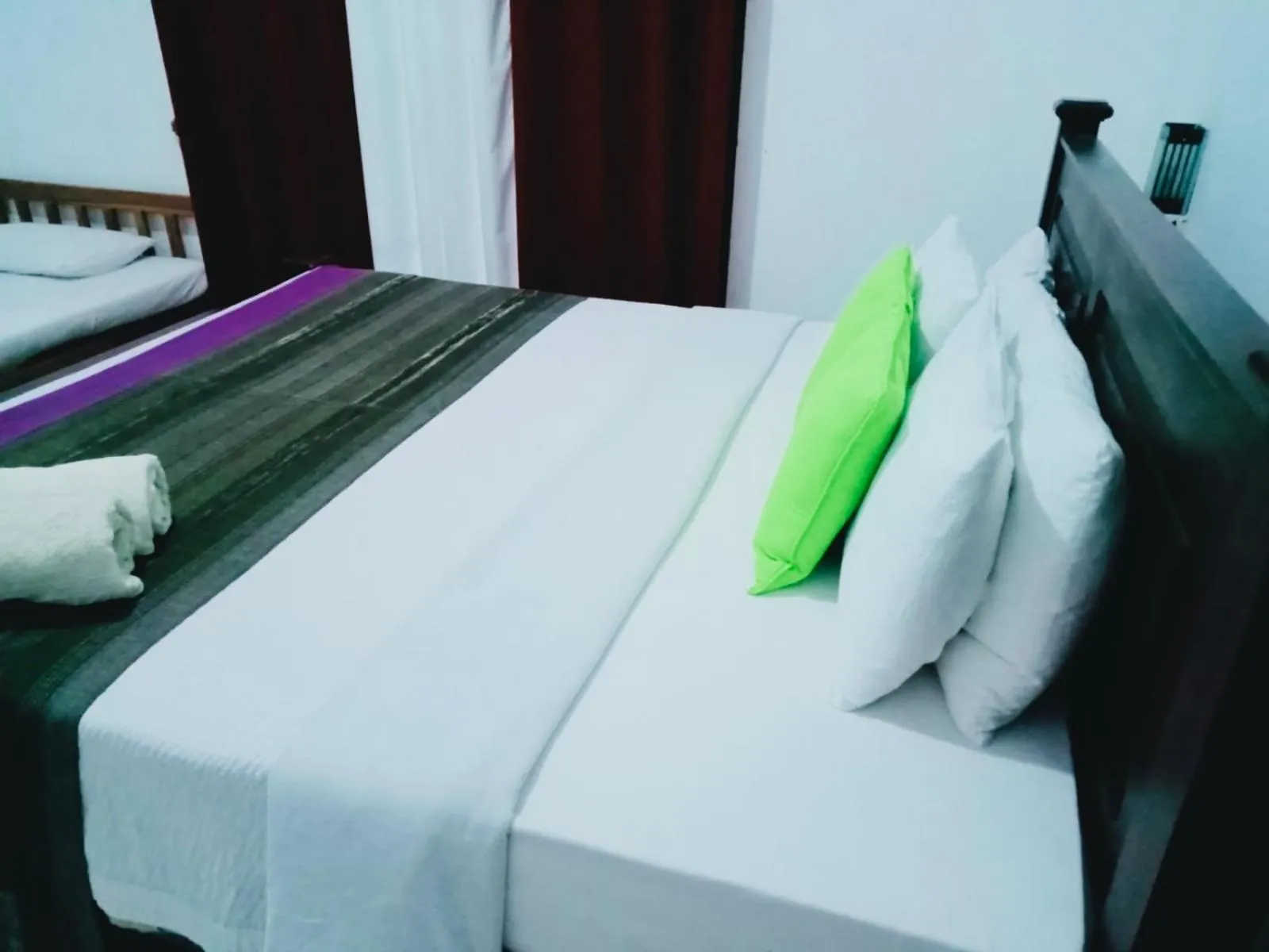 Bed in Bangalawa Resort