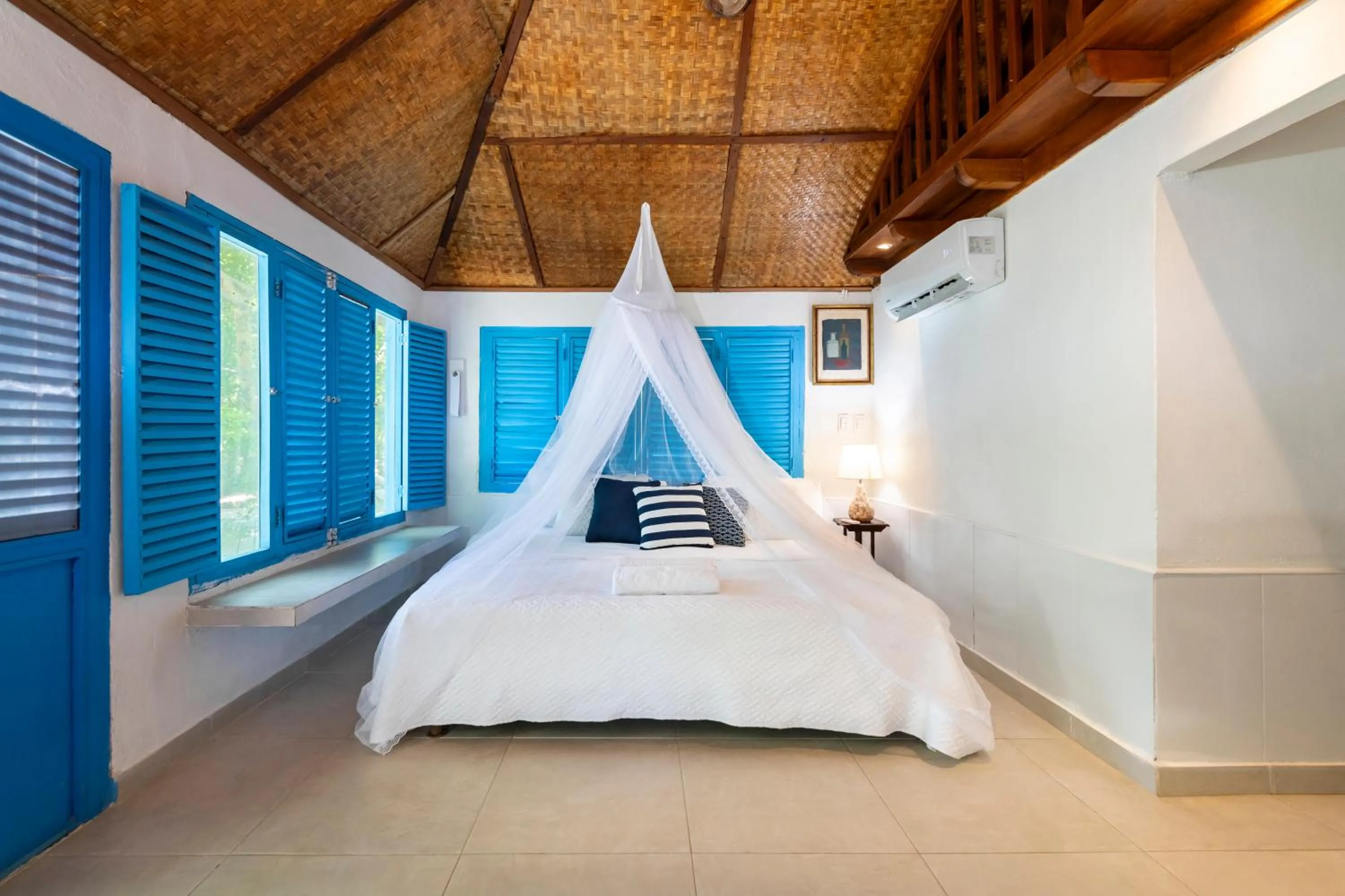 Bed in Hotel Coralina Island