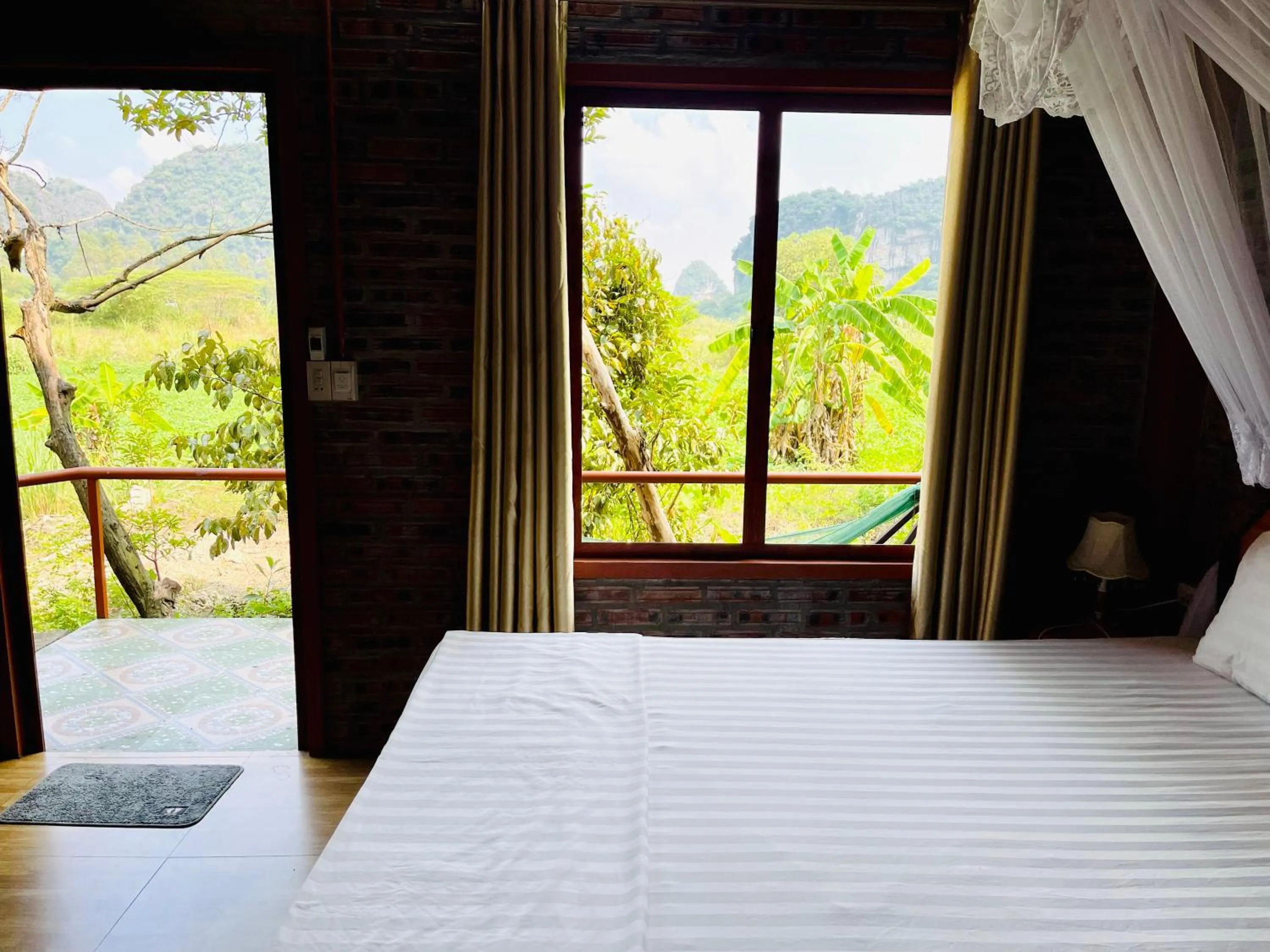 View (from property/room), Bed in Trang An Lotus Lake Homestay