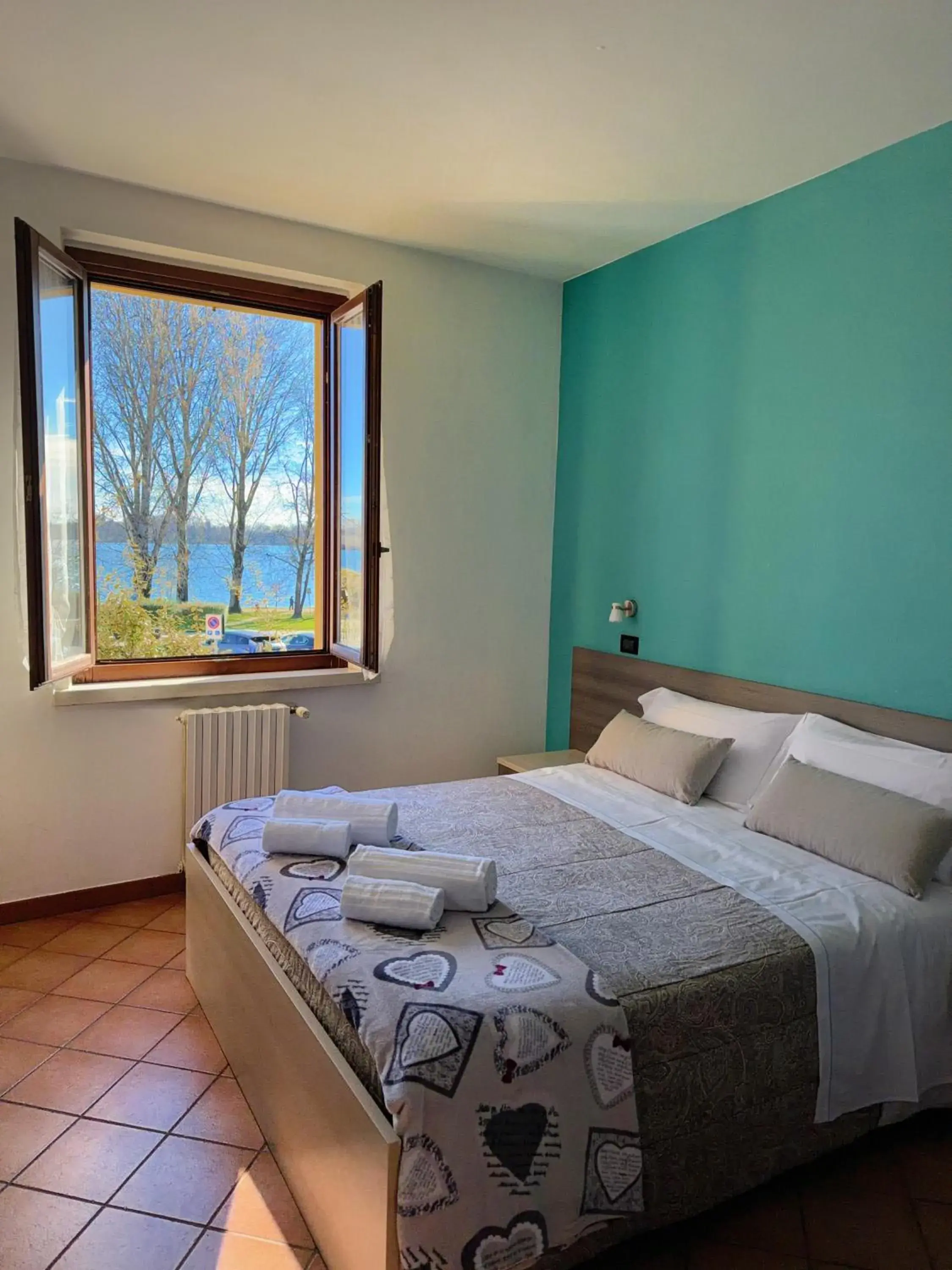Triple Room with Lake View - single occupancy in Residenza Bibiena Triple Room with Lake View - single occupancy in Residenza Bibiena
