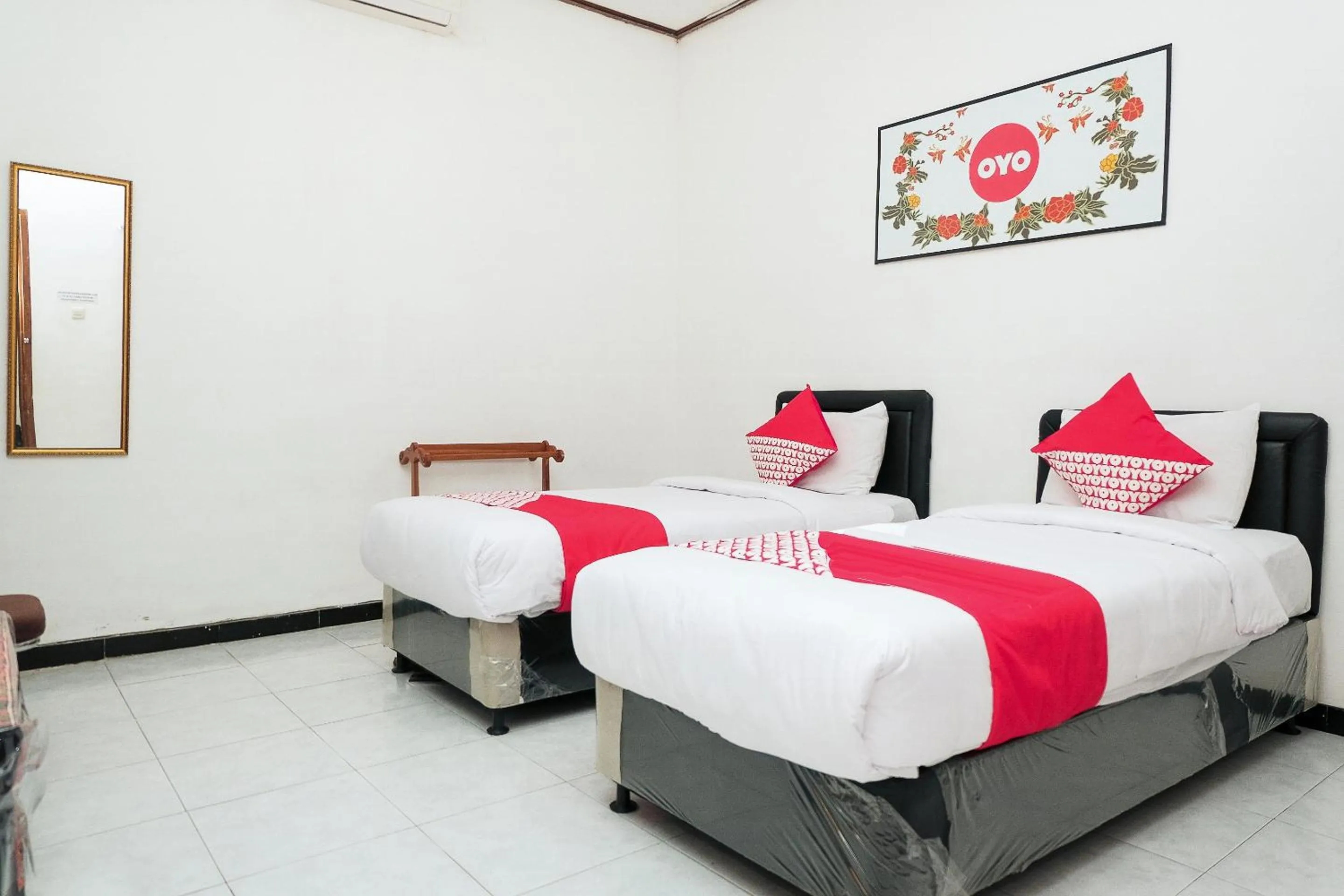 Bedroom in Hotel O Loesje Guest House Syariah