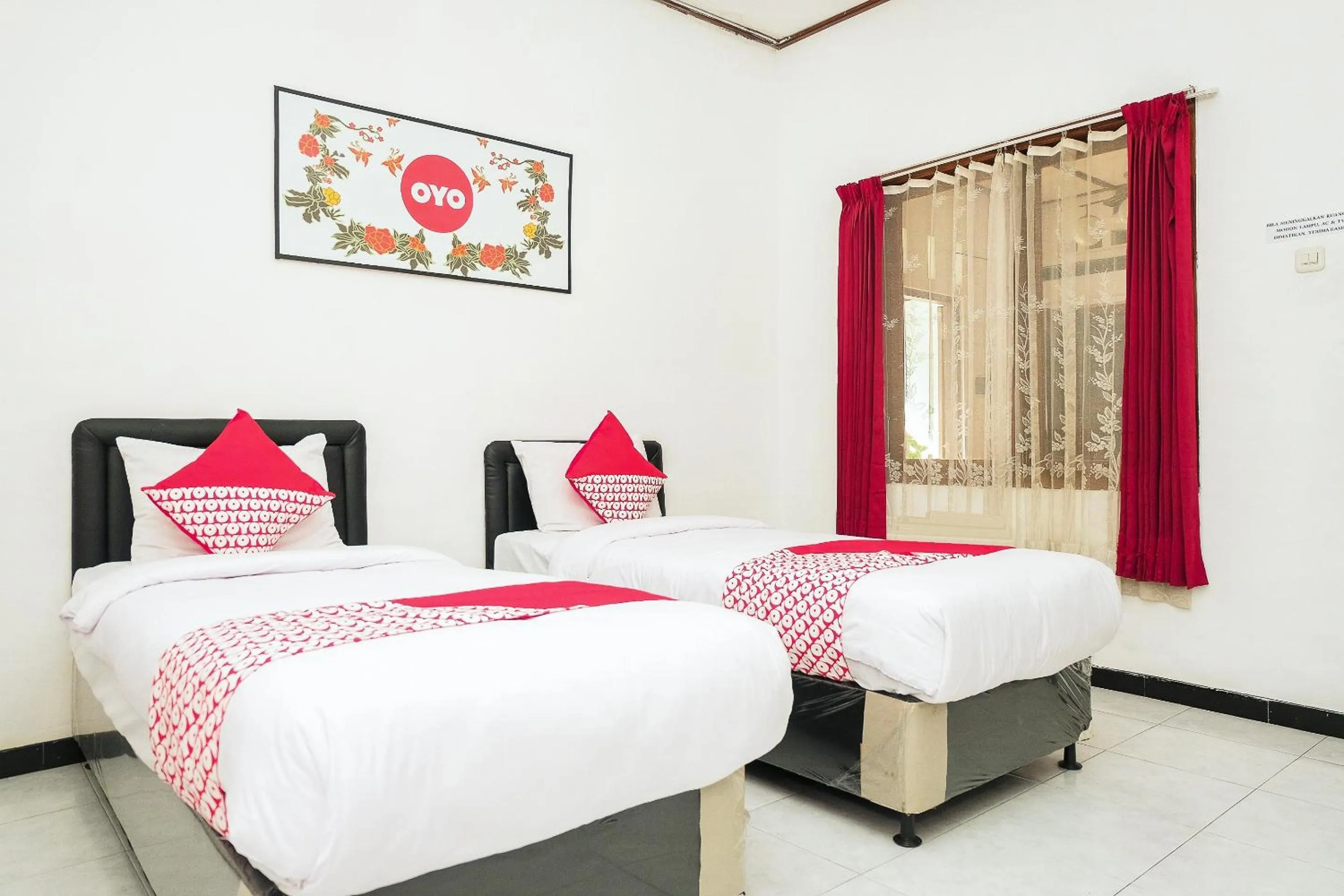 Bedroom in Hotel O Loesje Guest House Syariah