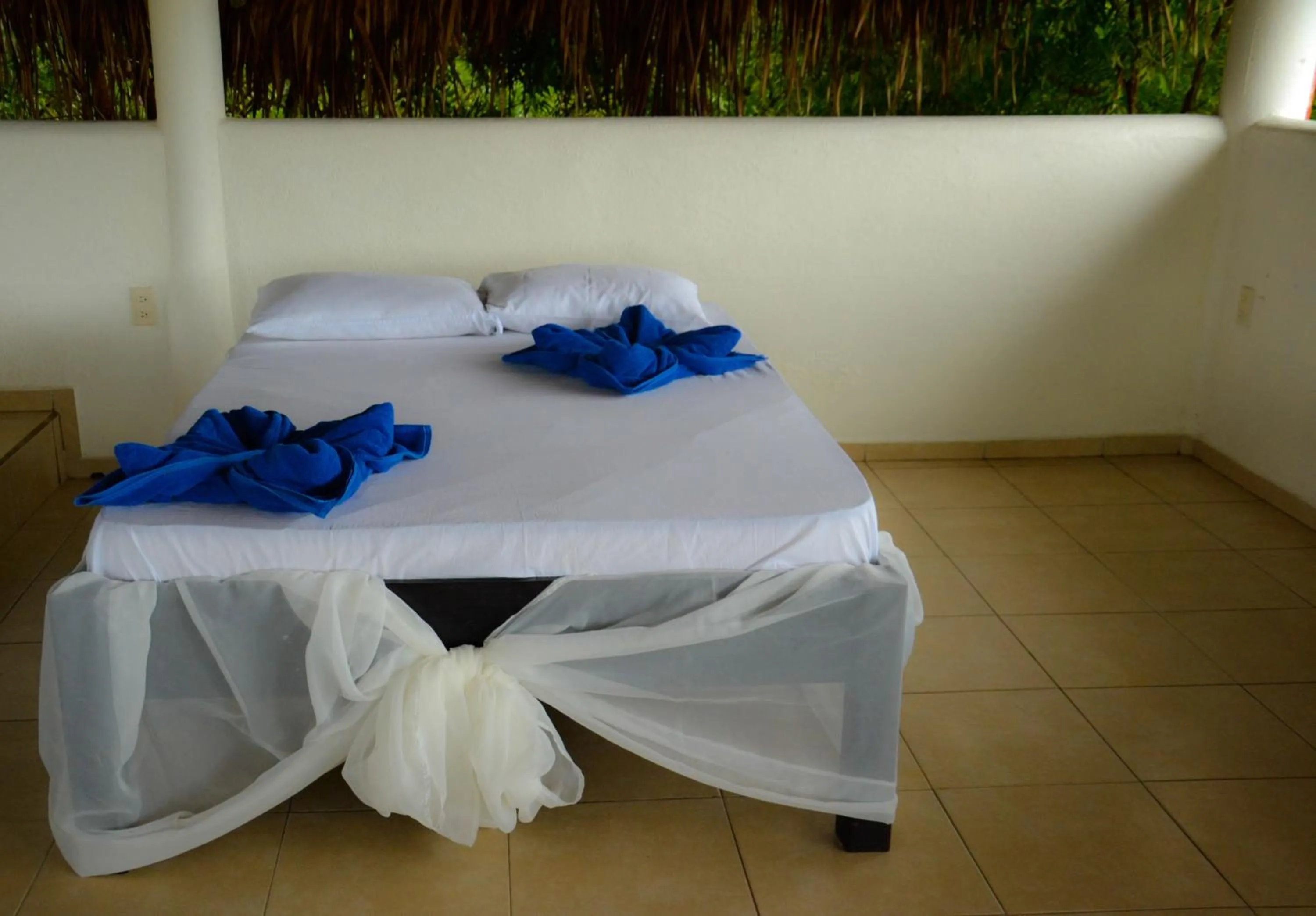 Bed in Bon Jesus Hotel