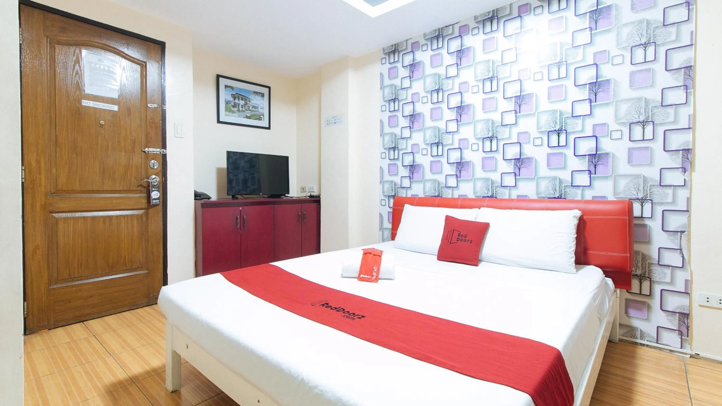 TV and multimedia, Bed in RedDoorz at DBuilders Rooms Ph2 Taguig