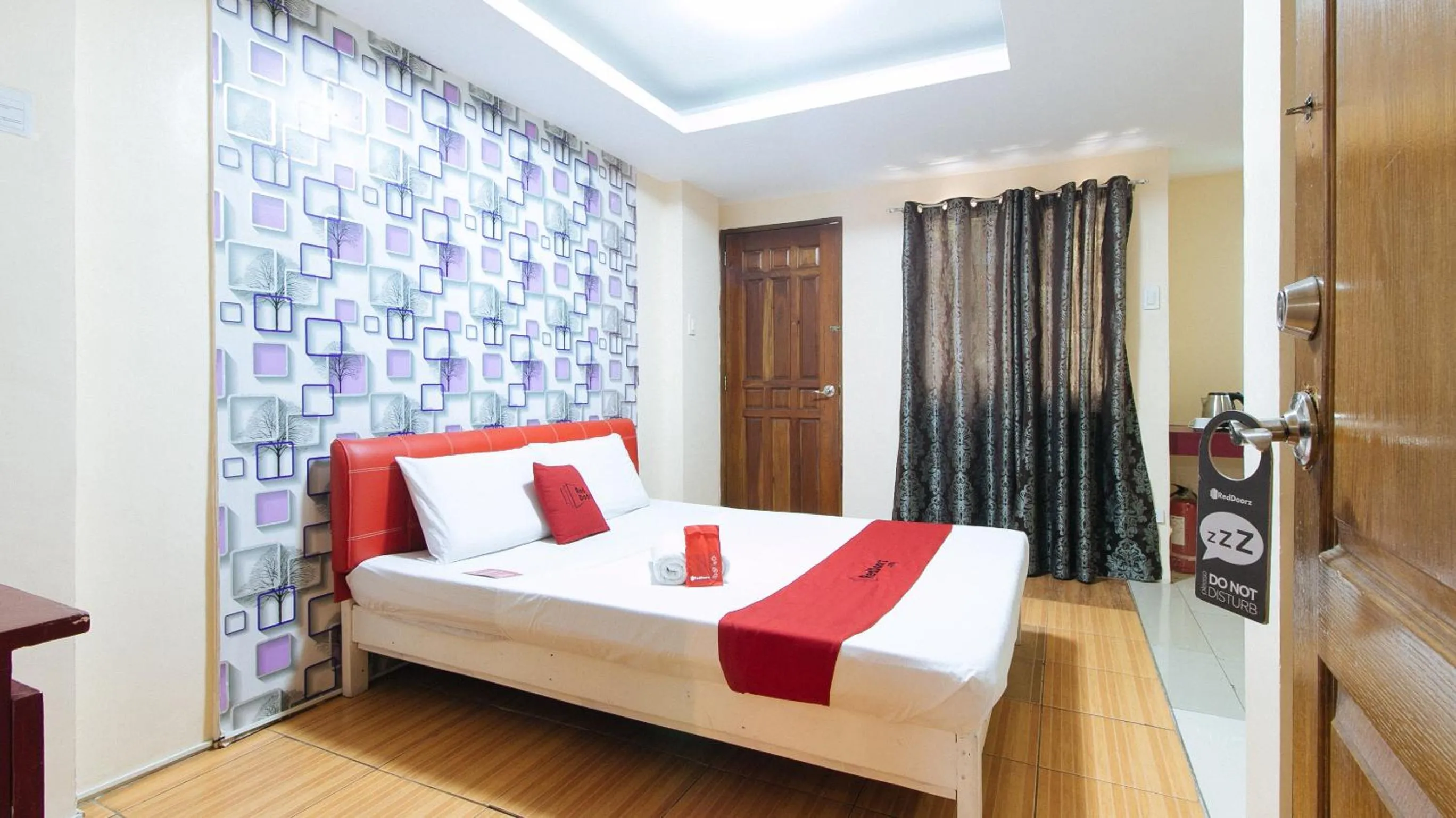 Bedroom, Bed in RedDoorz at DBuilders Rooms Ph2 Taguig