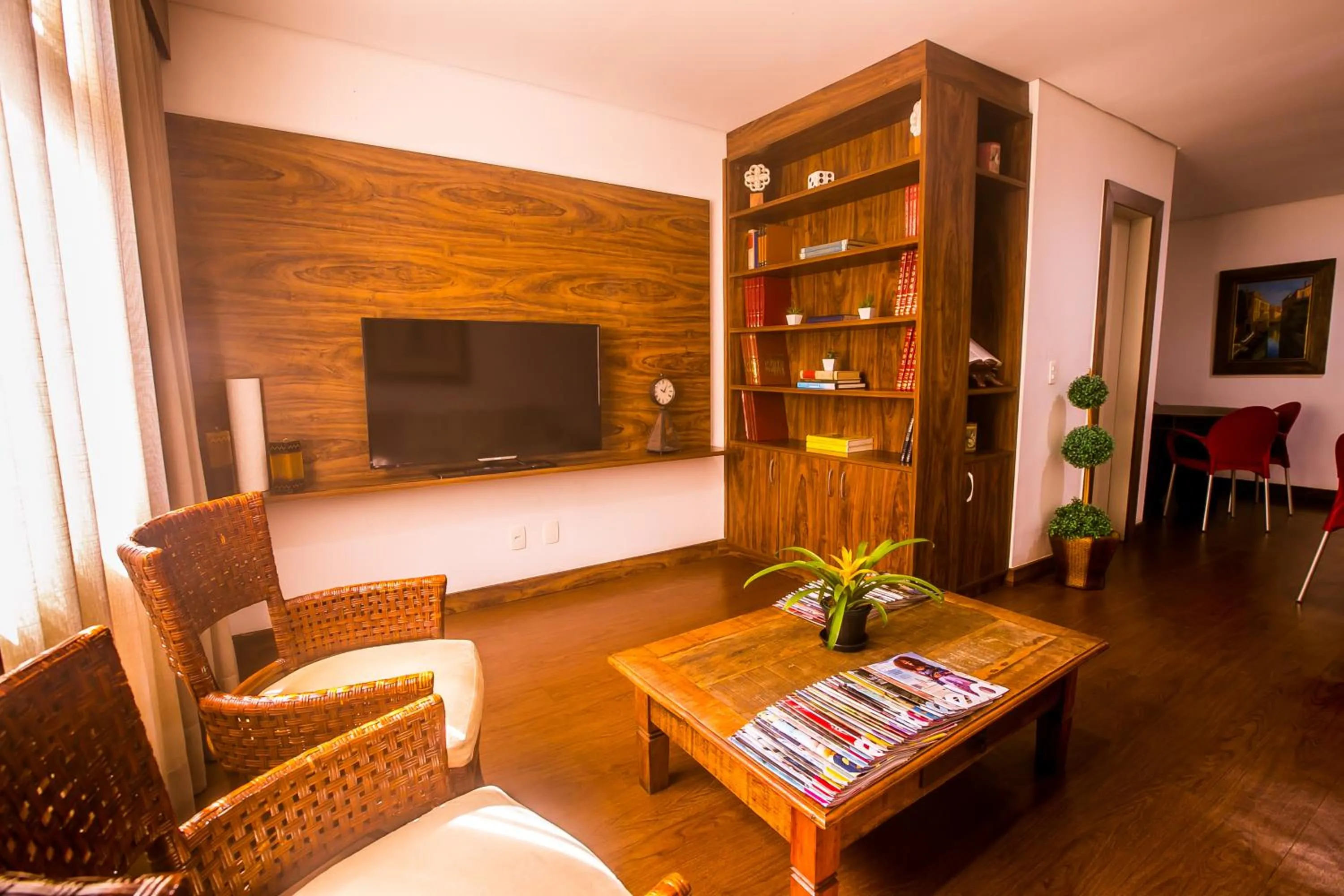 Communal lounge/ TV room in Hotel Flat Itaipava